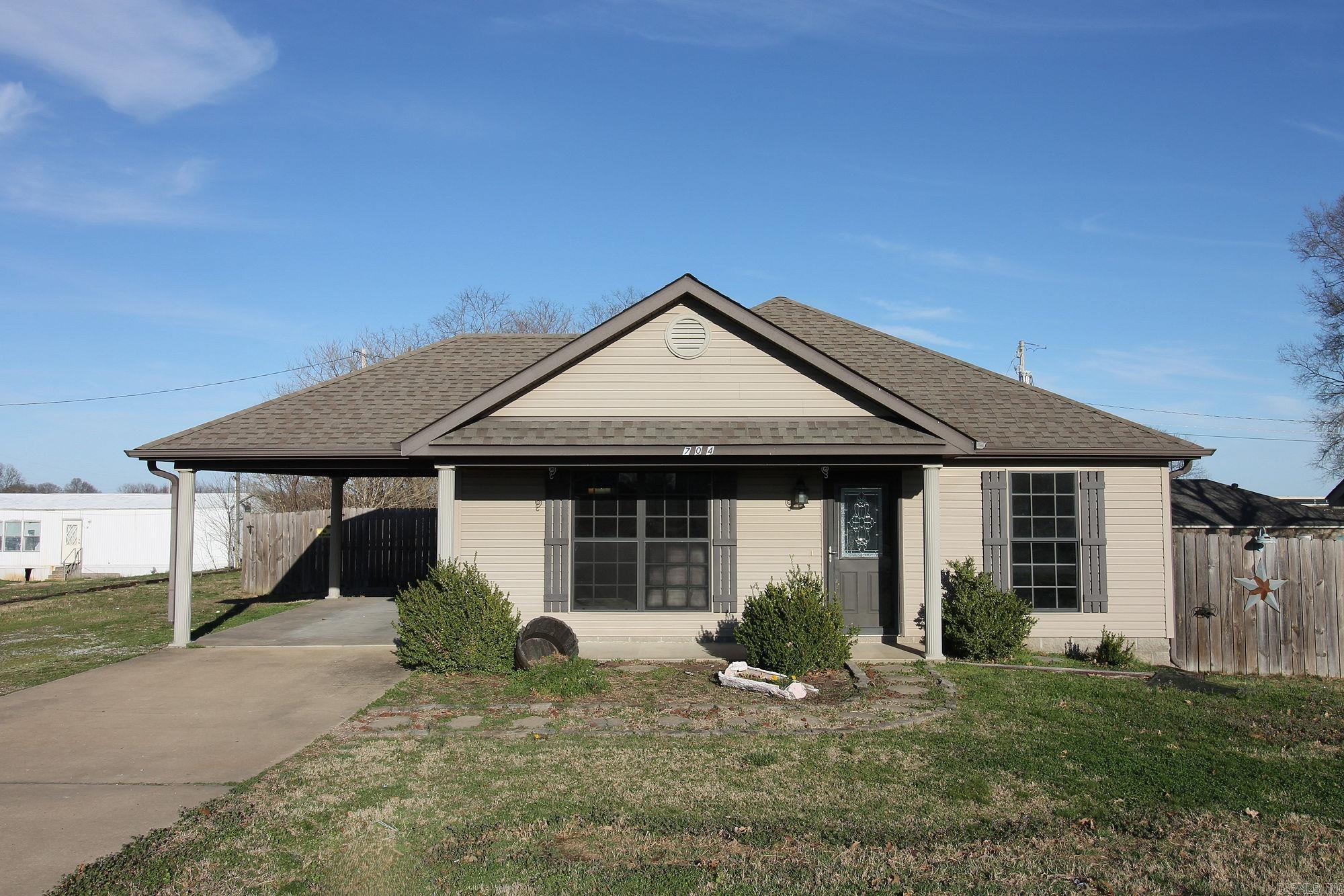 Charming 3-Bedroom Home with Modern Updates in the Quaint Small Town of Marmaduke! This beautifully updated 3-bedroom, 2-bath home offers a desirable split floor plan, providing privacy and functionality. Fresh paint and brand-new LVP flooring throughout create a modern, move-in-ready feel. The spacious fenced yard is perfect for pets, outdoor entertaining, or simply enjoying the peaceful surroundings. A large storage building provides ample space for tools, hobbies, or extra storage needs. Nestled in a charming small-town setting, this home offers the perfect blend of comfort, convenience, and community. Don’t miss this opportunity—schedule your showing today!