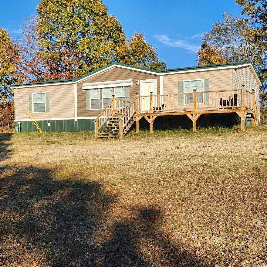 Wonderful, Must See, Rural property with a very well maintained 3 Bedroom, 2 Bath Manufactured home sitting on about 9.5 acres of beautiful rolling country acreage. Master Bedroom has a large master bath with separate tub and shower. Brand New roof in 2022 and new flooring in 2020. Big Front Deck to sit on and watch the sunsets and wildlife. Approx 7.5 acres of field and 2 acres of woods. The field does make good hay. Several fruit trees on the property like Apple, Peach, Pear, Plum and even a couple of walnut trees. Property also has a 50 X 30 metal shop building with electricity and a wood burning heater. Shop has 2 large slider doors, 1 small slider door and one regular entry door. This is a true country haven home and property.