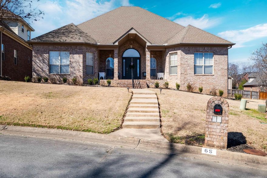 Nestled in the serene Villages of Wellington, this beautiful one-level home offers a peaceful retreat with easy access to West Little Rock's top amenities. This home is within walking distance to a community pool, park, and tennis courts. This all-brick gem features two spacious living areas and showcases gleaming hardwood floors throughout the home. The inviting great room includes a cozy fireplace and custom built-ins, while the chef's kitchen is complete with ample cabinets, counter space, and stainless steel appliances. The luxurious master suite boasts a private sitting area and dual walk-in closets, with an en-suite bathroom offering a double vanity, walk-in shower, and a relaxing jetted tub. Enjoy outdoor living with a charming covered front porch and a spacious patio perfect for entertaining. With a beautifully landscaped yard and convenient access to shopping and dining, this home is the perfect blend of comfort and convenience.