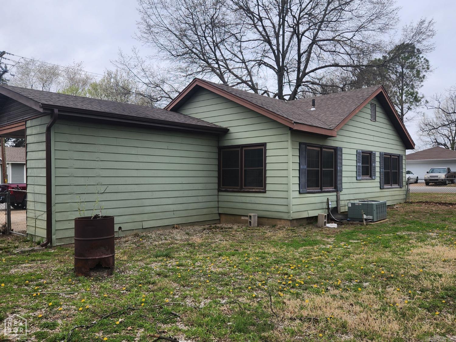 Location, Location, Location that what you have in this Home. It is 3 Bedroom, 1 Bath with large living room, fenced in backyard, large shade treed lot. Roof recently replaced, very well insulated, Maintenance free exterior.
