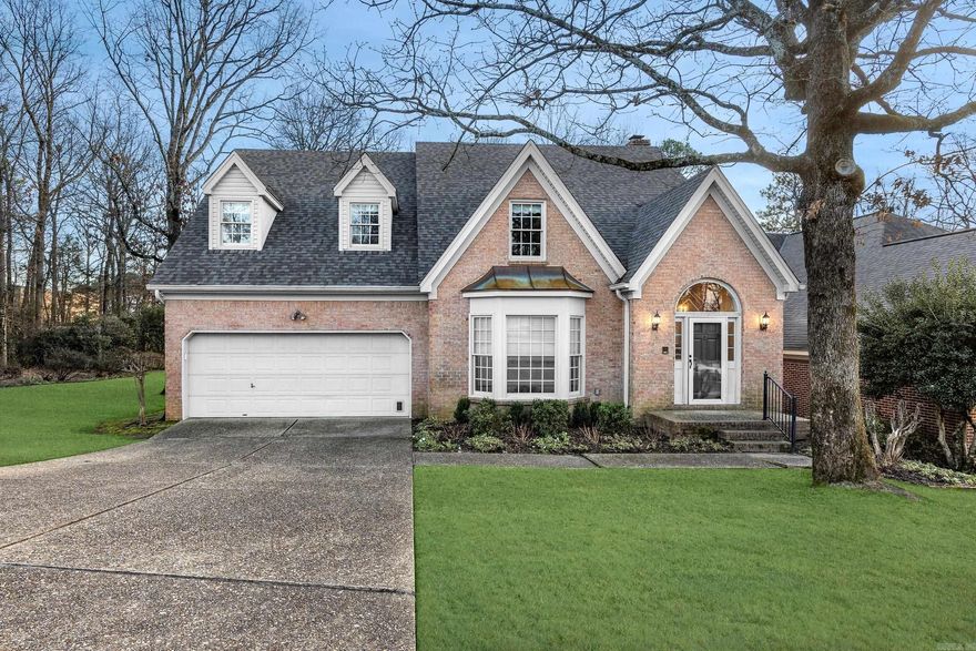 Beautifully maintained home in Pleasant Valley Manor that sits on 2 lots! .  Primary bedroom on the main level.  Gorgeous sunroom off living room.  New carpet, some new paint, wet bar, formal dining room and breakfast area off kitchen.  Incredibly landscaped back yard with outside storage shed.