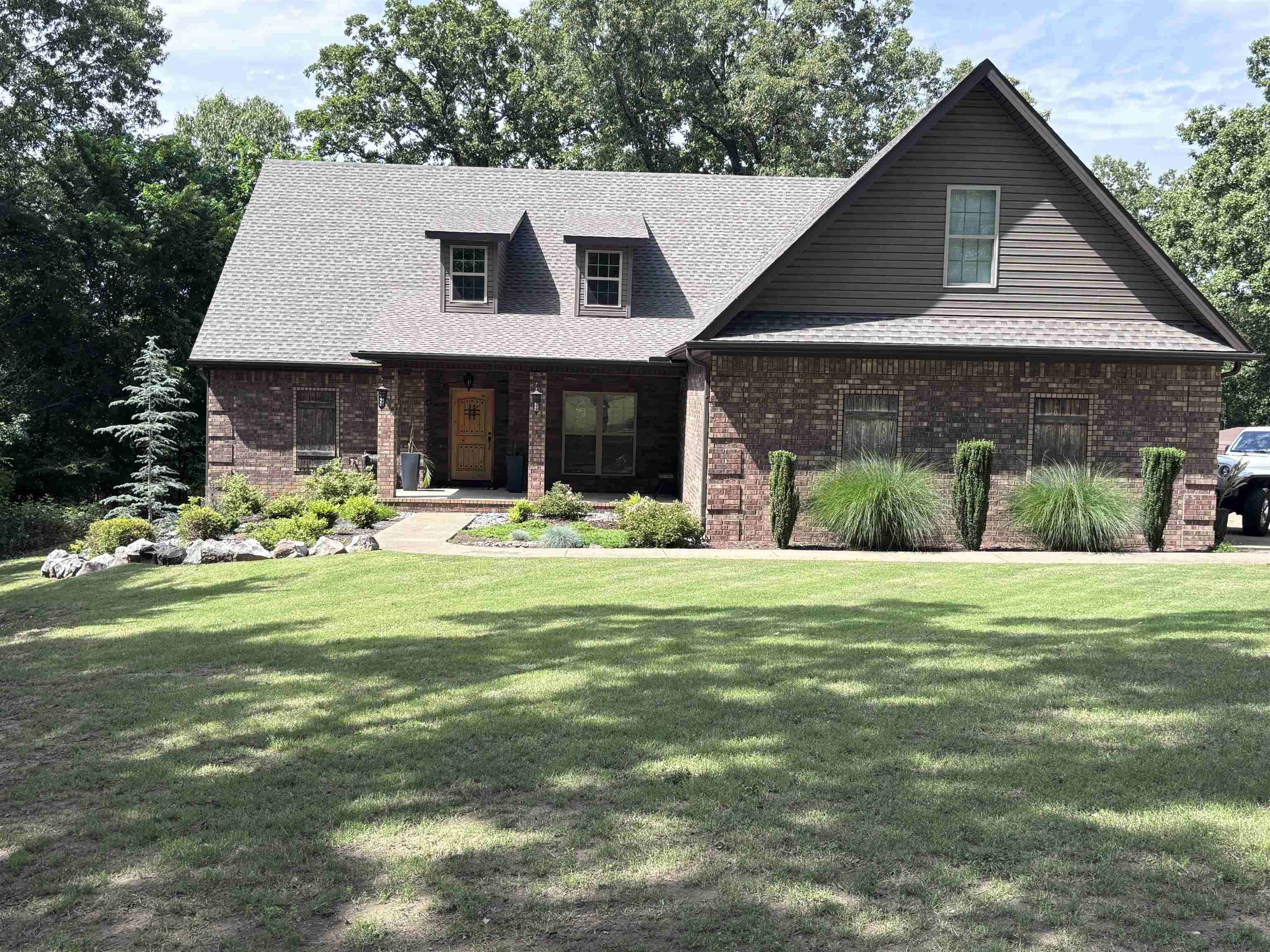 This is a rare find with an acre +/- of property in the Jonesboro City Limits and the Brookland School District! Welcome home to 4910 Peachtree in Jonesboro, AR. This spacious home features 3 bedrooms and a bonus/4th bedroom and 3.5 baths on a beautiful shady lot on the outskirts of town! You will fall in love with the beautiful finishes in the home including hardwood flooring, granite countertops, a spacious living room with fireplace and a large formal dining area. Enjoy privacy and convenience in one of Jonesboro's most desirable locations.