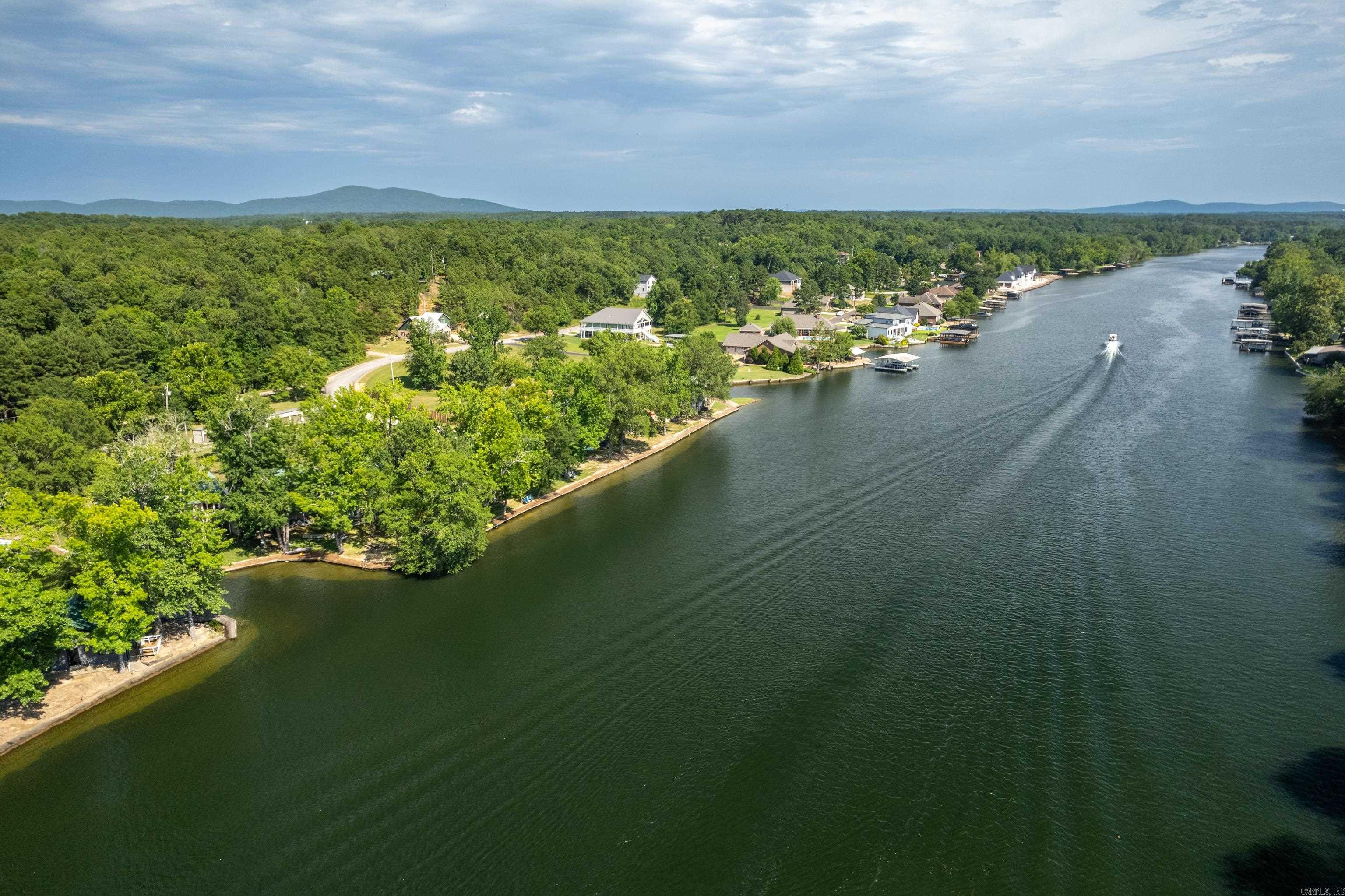 Rare opportunity to own Lakefront Property 30 feet from waters edge at a low, low price that is affordable!. Highly sought after Ground floor. Cozy 1 Bed 1 Bath Condo has been completely remodeled. New Paint, fixtures and New Luxury Vinyl Flooring. Refrigerator remains. Fantastic Lake Views from inside or Back Porch. New beautiful Boardwalk surrounds the entire property. Great for Fishing or for Boating. No stairs or even steps anywhere! Tankless Water Heater. Water paid by POA. Well managed POA. AirBnB's and Short Term Rentals are allowed.