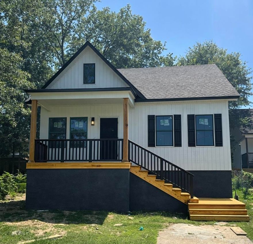 Charm & Modern convenience of living in downtown Benton.  Nearly finished new construction. Currently waiting on a few interior & exterior finishes, exterior porches, parking pad & sod.   Features:  • Open living & kitchen  • Stainless steel appliances + granite + large island  • LVP flooring throughout  • 2 bedrooms | 2 baths w/quartz counters  • Primary bedroom with walk-in shower & closet  • Laundry closet  • Front porch + back porch All within walking distance of downtown Courthouse Square, shops, & entertainment.