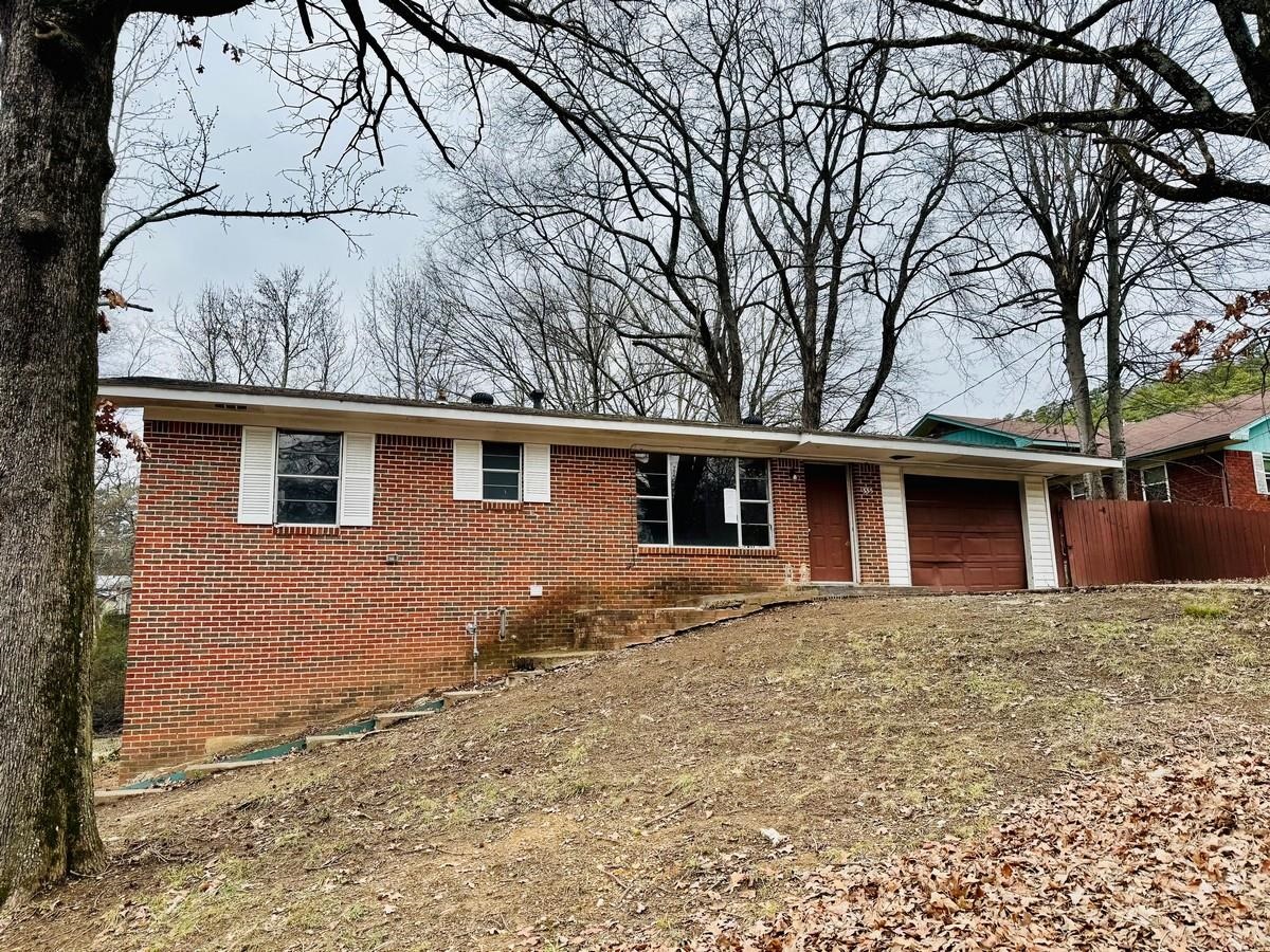 One level brick ranch style home conveniently located within the city of Hot Springs. Home features 2 bedrooms, 2 full bathrooms, central heat, central cool, attached one car garage, open porch, wood deck, patio, partially fenced backyard and a partially finished basement. HUD Case #031-497768, FHA Financing: UI (Uninsured). Property is sold in as-is condition, no warranties, guarantees or representations.