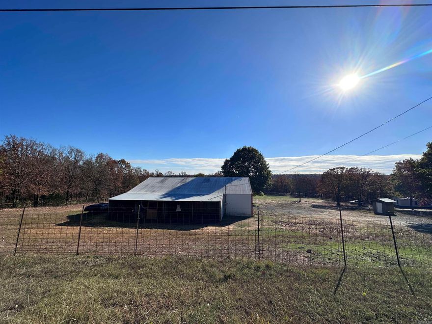 Unbelievable opportunity to own a large tract of land outside of Cabot but yet close to everything. Secluded towards the end of Quail Ridge offering an ideal location for a homestead with a pond and all the wooded area you will need. Barn is plumbed and offers ample room for equipment and storage. Pond is located near the front cleared area and could easily be cleared out additionally for an amazing view from the home site. Property is fenced for horses as well!  Quail Ridge does border the property and could be divided up into other home sites for development opportunity as well. Agent see showing remarks.