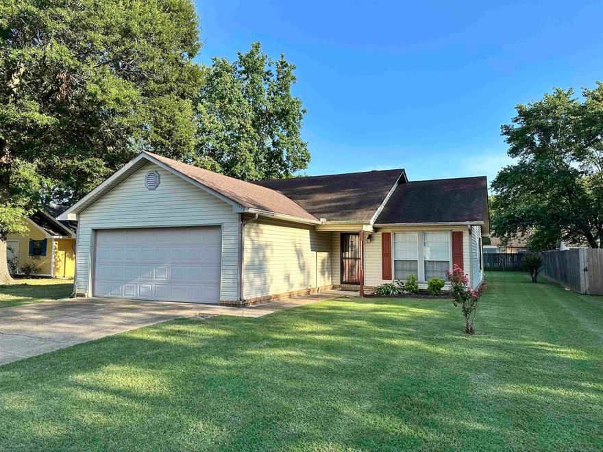 Take a look at this nice three bedroom two bath house.  It has a two car garage, laundry room, and covered back patio.