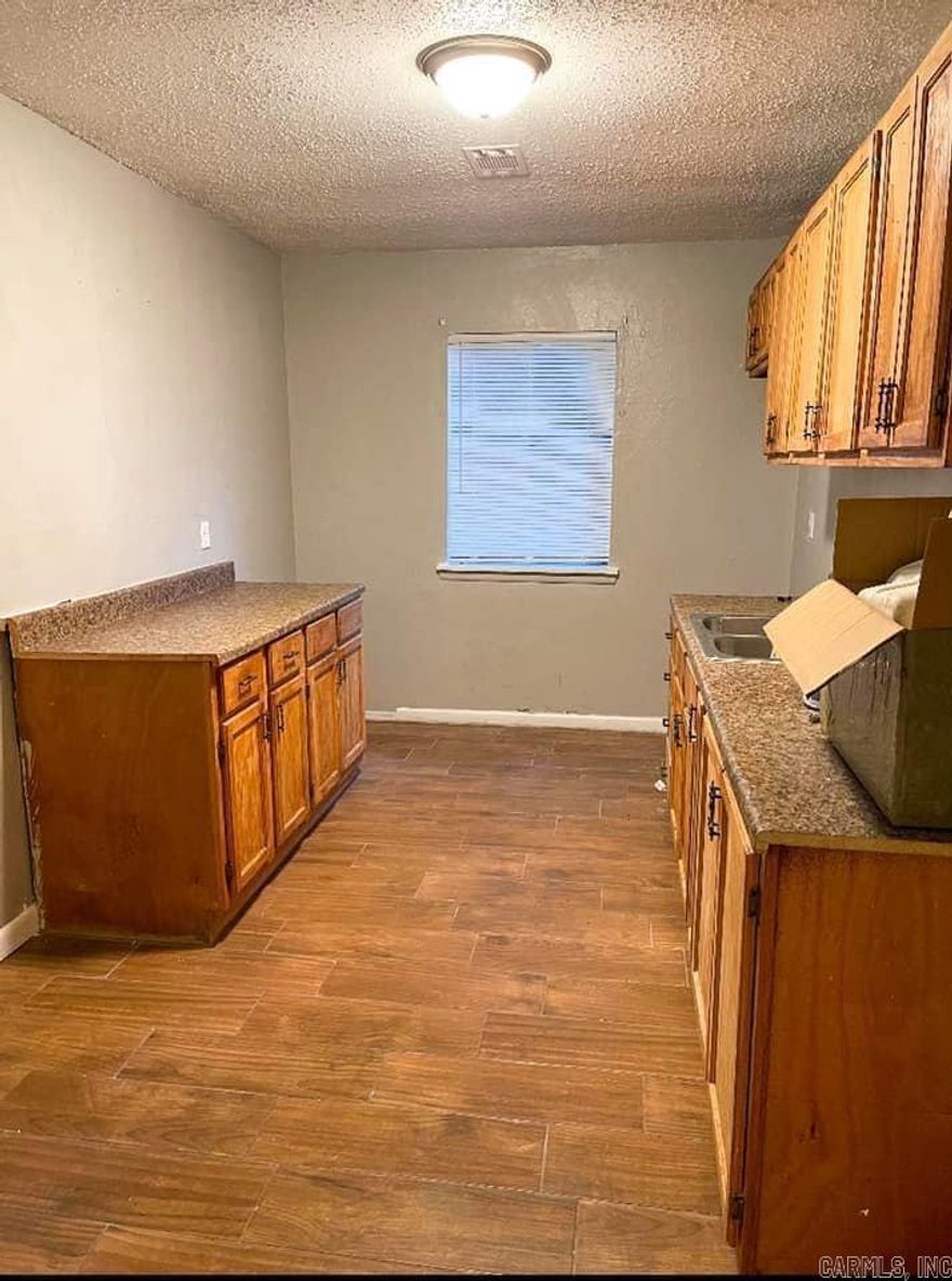 ATTENTION INVESTORS!!!  This is one you wont want to miss!  A well maintained home with ceramic tile floors throughout! Large yard for plenty of room for the kids to play and not to mention the new beautiful school that is being built in the Watson Chapel School Dist! This home is priced to sell AS IS, as well as being income producing. Tenant pays $900.00 monthly! Please allow 24-48 hour notice for showings. Call today for more information and to schedule your showing!