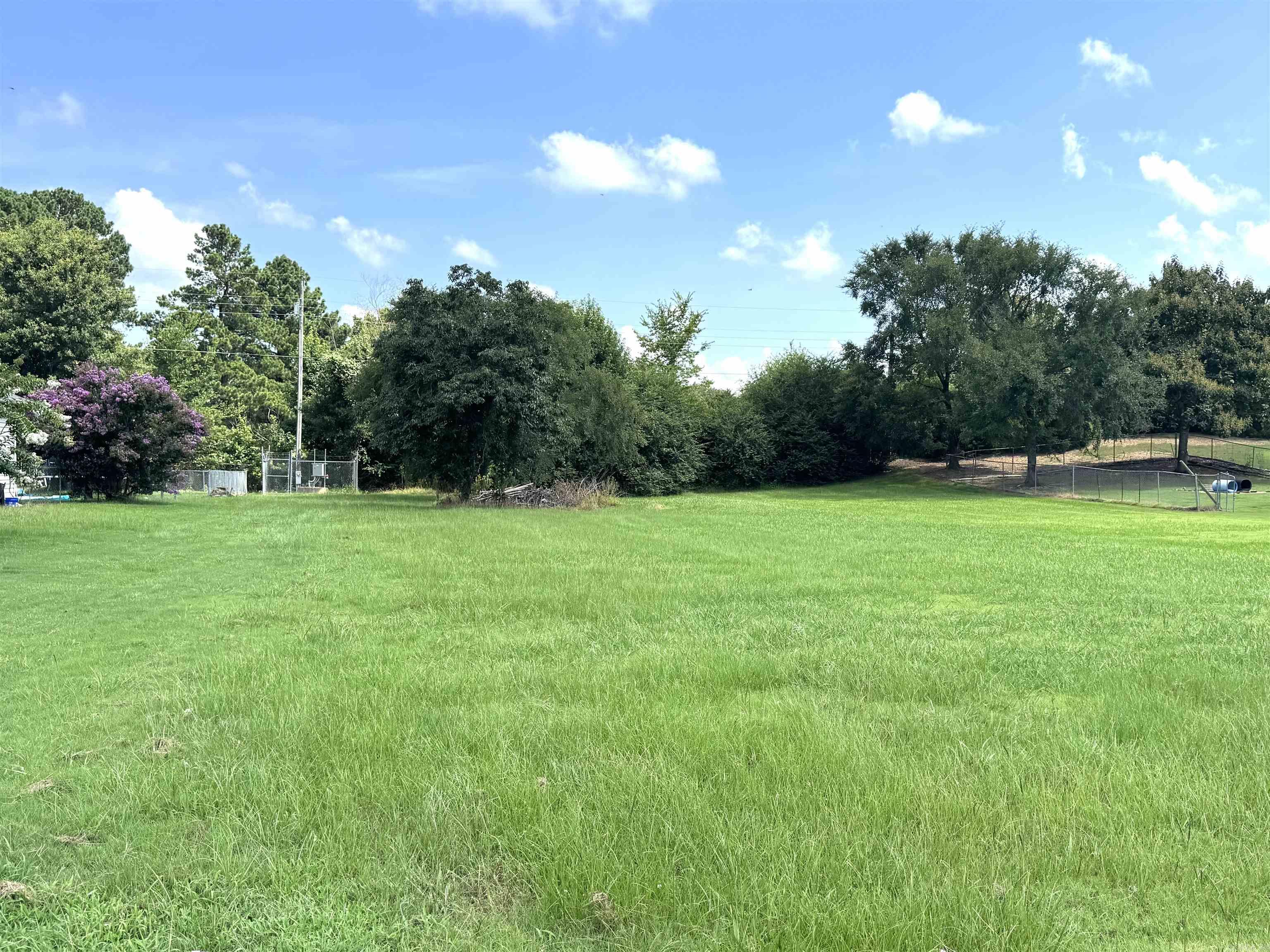 Beautiful lot with over 1/2 of an acre in Oak Shadows in Sherwood! Perfect to build your dream home. Pine Valley 18 hole golf course is your neighbor! Close to the Air Base and the highway for an easy commute.