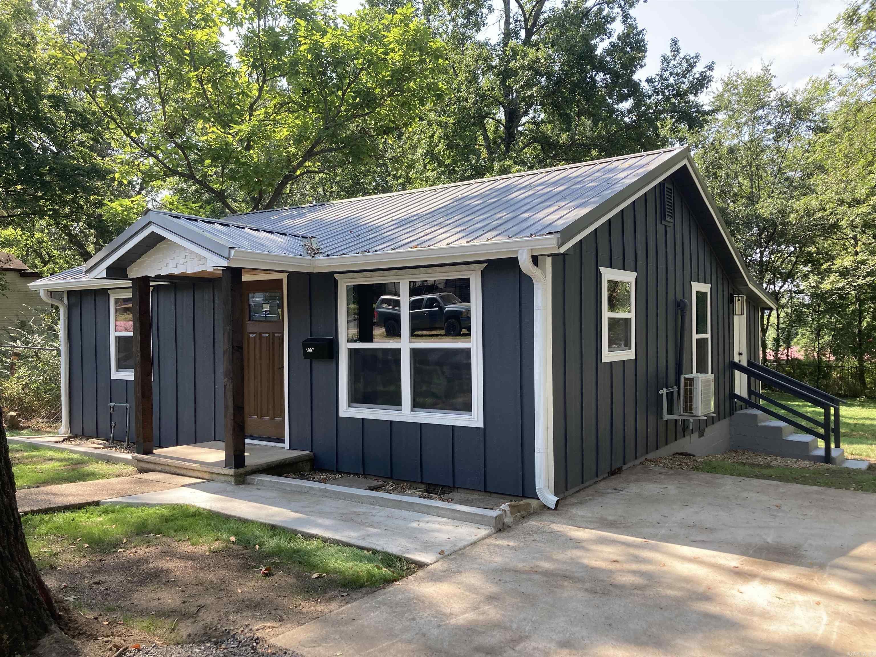 VERY cute, fully remodeled home in the heart of Mena! Walking distance to main street and close to everything Mena has to offer. This is move in ready with every finishing detail executed. New Roof, siding, flooring, windows, fixtures, completely remodeled kitchen with granite breakfast bar, new GE appliances, freshly remodeled bathroom, back porch addition, too much to list...EVERYTHING is sparkling new in this place. Would also make an excellent investment for a short or long term rental as well.