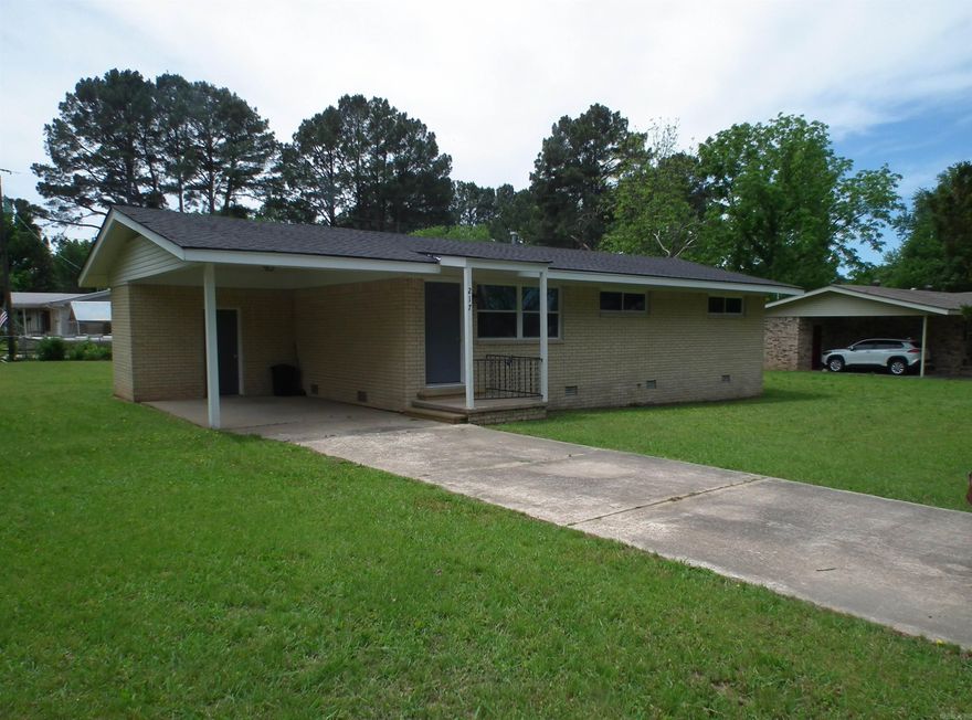 Check it out !!!  Beautifully updated 3 bedroom 1 bath home situated on a corner lot. New laminate floor, 6 panel interior doors, custom soft close cabinets, new counter-tops, light fixtures, stove & dishwasher, interior paint, built in pantry and windows. Lot is large enough for a storage building and separate drive entrance.