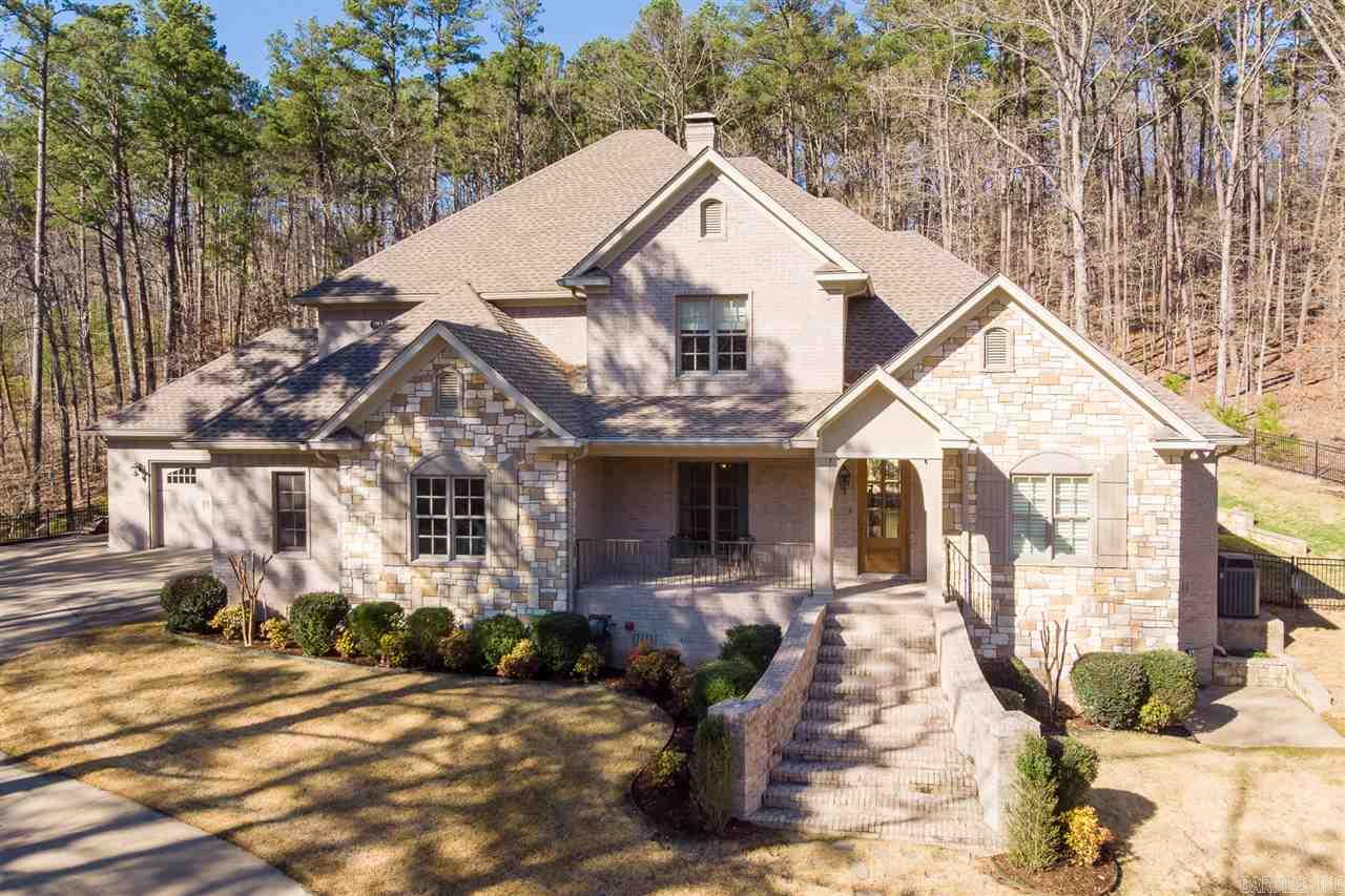 Enjoy private, 5 acre retreat... quiet, secluded with deer in gated neighborhood. Cozy screen porch provides fresh air living. Hardwoods, butler's pantry, plantation shutters and whole home generator. 2 story great room w/floor to ceiling windows surrounded by nature. Open chef's kitchen- gas Wolf dual fuel range, 48" Dacor refrigerator, maple cabinets, large granite center island, SS appliances. Breezeway off garage, utility shower, large laundry. Versatile 4th bedroom/office. Fully fenced; Immaculate!