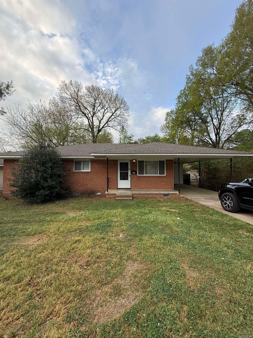 Charming 3BR/1.5BA brick home in Interurban Heights! This 1,200 sq. ft. residence features original hardwoods, a fireplace, and an open kitchen/dining layout. Highlights include a covered carport, storage shed, and a large 0.20-acre lot. Located within walking distance of Bale Elementary and less than a mile from UA Little Rock and Boyle Park. Quick access to I-630 and Midtown dining.