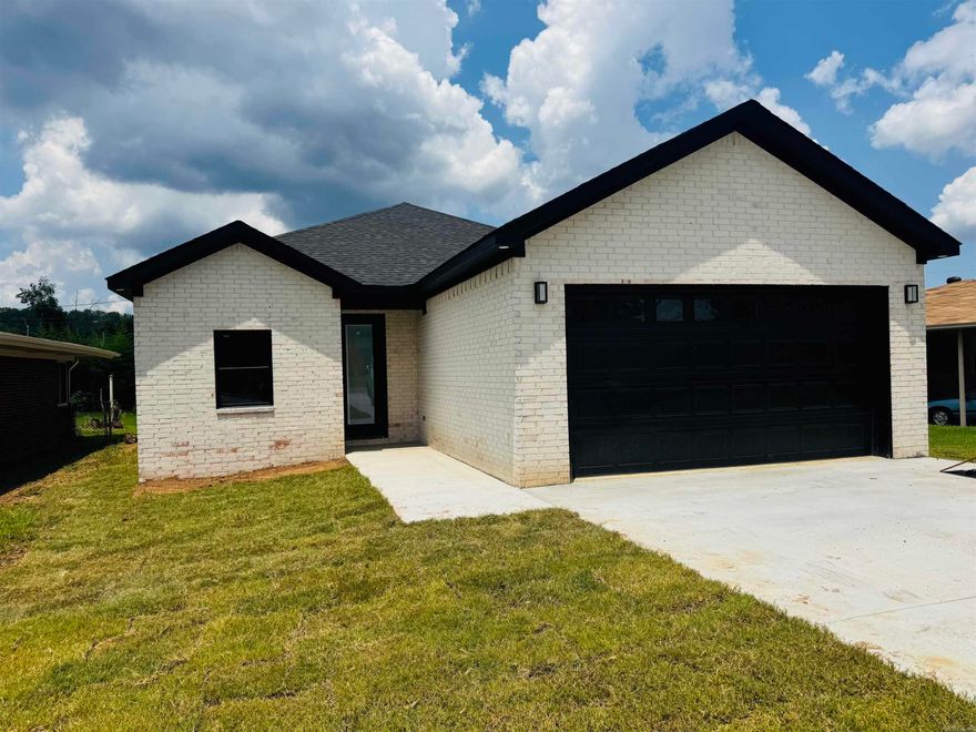 New Construction! Discover exceptional quality and comfort in this stunning all brick build just steps away from all of Burns park amenities. This thoughtfully designed home features luxurious finishes throughout, including custom cabinetry and beautiful matte finish granite countertops. With a smart layout, spacious living areas, and attention to every detail, this home offers both functionality and refined charm.  Whether you're entertaining guests or enjoying a quiet evening in, you'll appreciate the seamless blend of craftsmanship and convenience. Both living area and master bedroom offers a built in electric fireplace  with comfort at the touch of a button!  Lets not forget about your vehicles, we got you covered on that as well with this 2 car garage!! Easy commute to North little rock, Little Rock and Maumelle... Book you a showing today and check it out for yourself!!