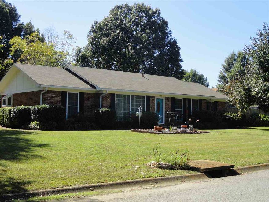 Wonderful 3 bedroom 2 bath home on almost an acre corner lot!! All nice and open floor plan.  Great room with wood burning fireplace for those cold evenings. Formal dining for special occasions.(it is being used as a sewing room now)   A remolded kitchen - any chef will love!!  Large laundry room with storage. New windows, roof, heat and air all within the last couple of years.   Make an appointment today!!! Agents see remarks