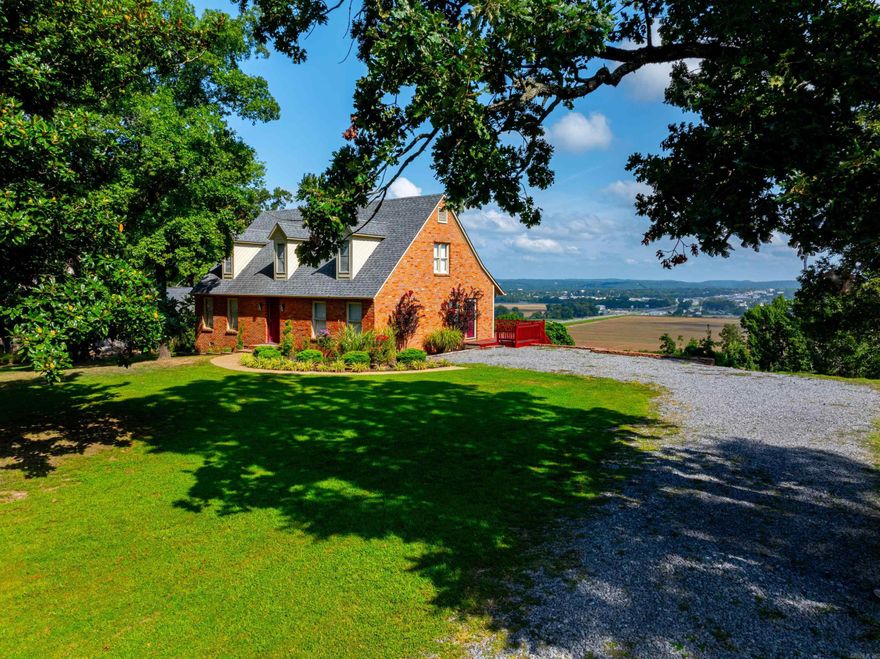 Stunning Views and Timeless Charm!  Nestled on a bluff with panoramic views of Batesville and the surrounding mountain ridge, this exceptional property offers the perfect blend of classic appeal and natural beauty. Spanning 1.35 acres, this home features 4 bedrooms, 2.5 baths, and a rich history with brick sourced from the original Batesville Savings and Loan building.  Updated in 2017 with newer shingles and an HVAC unit, this home is ready for modern living. Enjoy unforgettable moments grilling on the deck while watching fireworks on the Fourth of July or taking in the spectacular Christmas light display each year.  Discover a lifestyle of extraordinary beauty, where every moment feels like you're on top of the world.