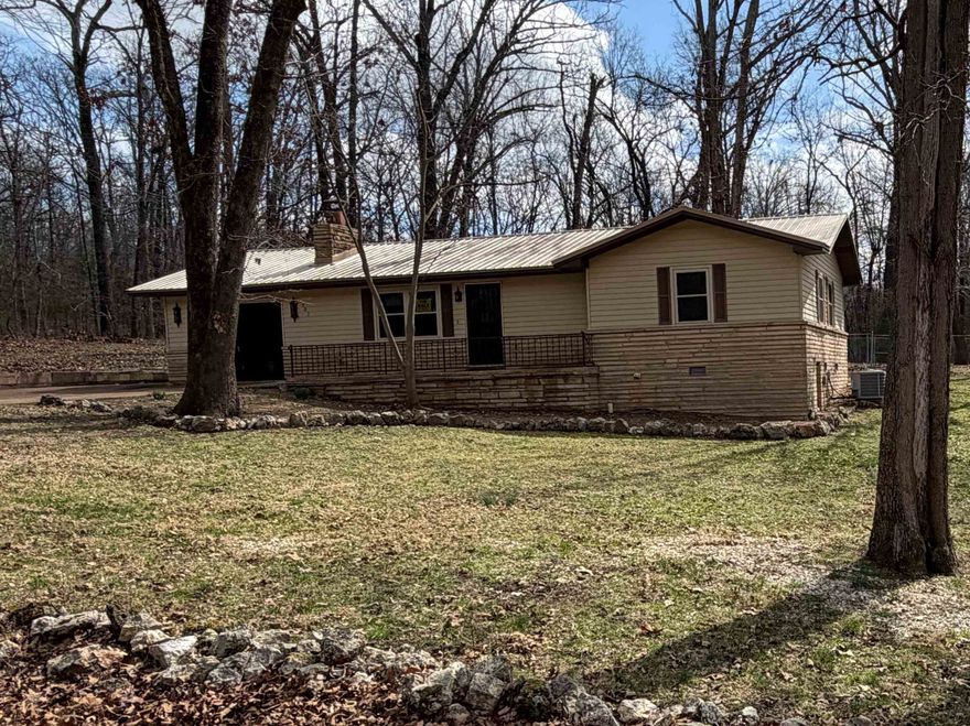 Can we say cute? This 2 bedroom 1 and 1/2 bath cottage style house is every bit of that. It features an open kitchen dining area. A gas fireplace to keep you cozy in the winter months. Central heat and air. Newer metal roof. New windows.  One car garage with a 2-car parking pad. Plenty of natural light. And the best parts about this house is the screened in back porch and is it's one block off of Crown Lake. It has seasonal lake views. It sits on 2 beautiful lots. This home is perfect for full or part time lake living. Call me today to see this cutie.