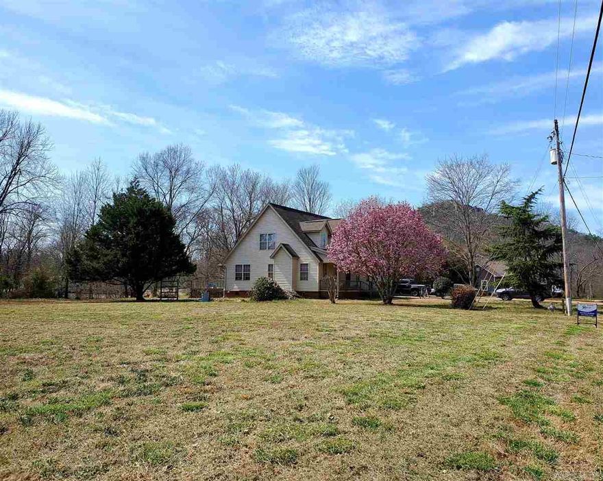 Waterfront lot cleared and ready to build on with all the City amenities but in the County.  Drive by and take a look at these perfect lot sitting on the Oxbow with view of Sugarloaf.  Great fishing out your backdoor or it's just a skip to the Little Red River (Winkley Shoals) and Barnett Access.   City sewer, city water, natural gas, and electric Co-op.  Wonderful subdivision with Bill of Assurance in place.    No mobiles allowed.  Min single story 1000 sq ft.  No livestock or animals other than house pets.  Can purchase both Lot 33 and Lot 34 MLS#23021954 for $79,900.00.