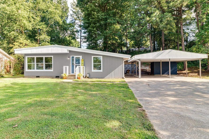 I don't even know where to start on this one,I could gush all day about it. Sooo ADORABLE! This home has been completely transformed and brought into the year 2024. All new flooring, paint, lighting, faucets, you name it. New HVAC in 2024. The kitchen has lots of cabinets and a pantry, a gas stove and stainless appliances. You could cook all day in there. The living room is large with lots of windows for natural light. A dining area sits between the kitchen and the LR for easy entertaining or family meals. A brand new retaining wall has been built in the back yard and the brick paver patio is perfect for grilling and entertaining or just sitting. The huge double carport also has a large storage room that also serves as a workshop. If you live in Pgld, you already know what a cool vintage area the Hillcrest area is. This established neighborhood with solid built houses now has an updated and modernized place to call home. These don't last, so call quick.