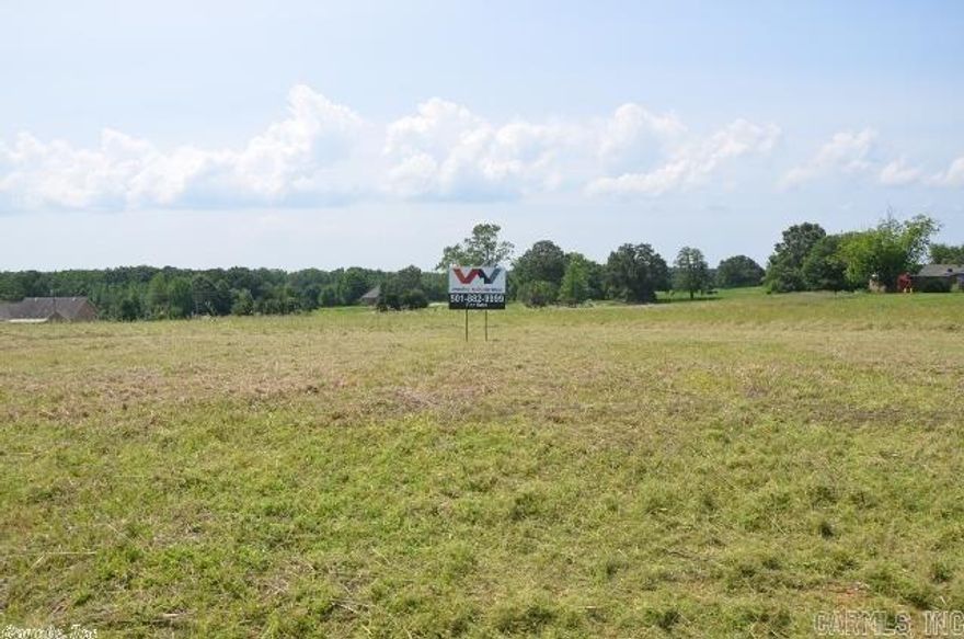 If you're looking for peaceful country setting with city conveniences you won't want to miss this one.  Ideally located minutes from the city and interstate with public water, underground utilities and beautiful rolling hills.  Minimum square footage 1,550. Road on county list to be chip sealed.