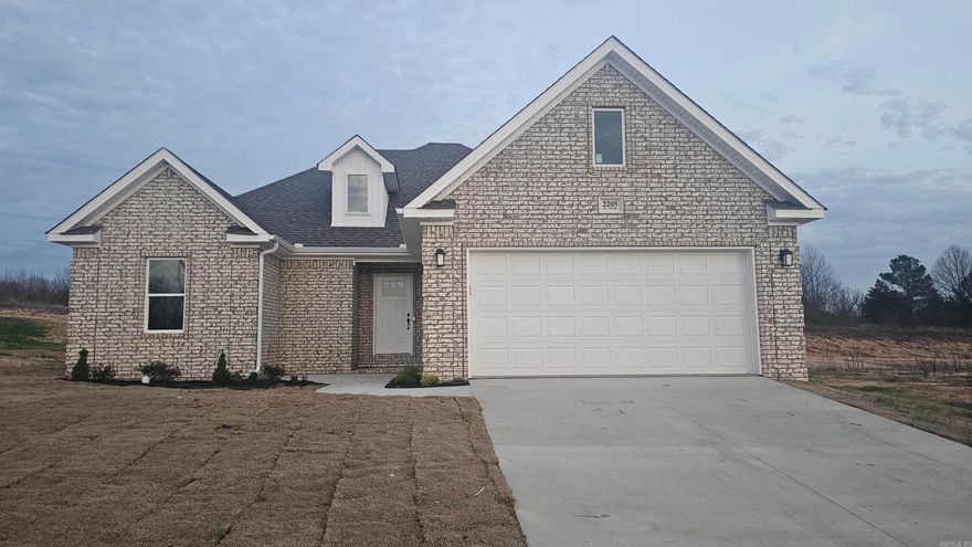 This beautiful new home in the Sierra Hills Subdivision features a semi-open floor plan designed for today’s lifestyle. The spacious great room offers flexibility to serve as both a living and formal dining area or one expansive gathering space. The eat-in kitchen is a standout with generous countertop space, a large island with breakfast bar, and elegant finishes throughout. The primary suite showcases one of our most popular layouts, featuring dual vanities, a custom tile shower, relaxing soaker tub, and an impressive walk-in closet. Two additional bedrooms on the opposite side of the home share a full bath. Gorgeous millwork, granite countertops, and quality craftsmanship can be found throughout this thoughtfully designed home.