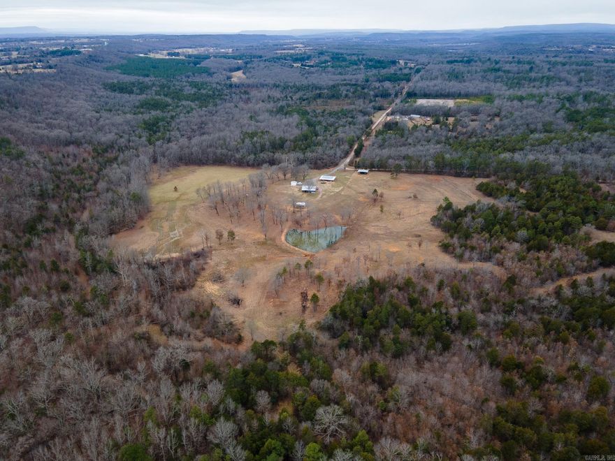 Wonderful farm nestled on over 120 acres in Hattieville with a fully stocked pond, creek, approximately 1100 ft.² main house with updates throughout and wrap around porch, 30 x 40 shop with electricity, 20 x 30 storage building, 30 x 30 barn, and a 20 x 30 cabin heated and cooled with a bathroom. This property is perfect for all of your outdoor activities. Great for hunting, fishing, ATV trails throughout, and separate fenced acreage that would be great for livestock. Plenty of room to house guests and store equipment. And would be an incredible spot to build your dream home! With it only being 20 minutes from Morrilton and 40 minutes from Conway, it makes this property the perfect recreational weekend getaway!