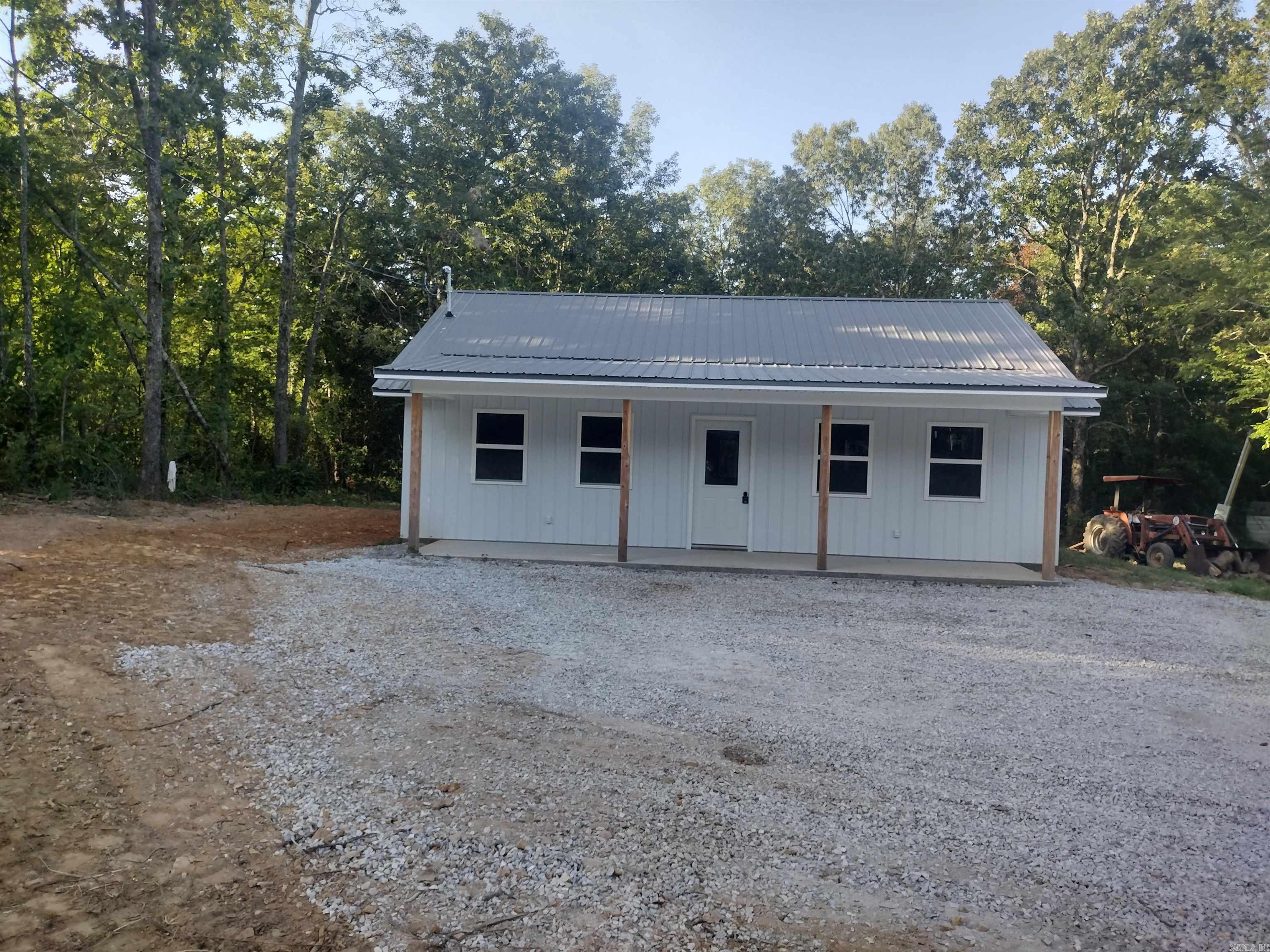 New Home in town, this two-bedroom one bathroom home features new appliances, natural gas tankless hot water heater, natural gas central heat, electric central air, spray foam insulation. Very nice home easy accessibility and close to the court square would make great vacation home or first home with nice .44-acre lot m/l.