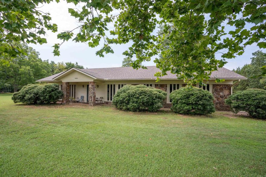 Are you searching for a property that suits your family's active lifestyle and is in an excellent location? Look no further! This ultra-cool ranch-style home is neatly situated on three large lots, and boasts 3 bedrooms, 3 bathrooms, and 2,524 square feet of open and functional living space. Imagine enjoying a round of golf, walking to the lake, hiking, fishing, kayaking, swimming, dining, and grilling at the Thunderbird Country Club, or launching your boat—all just a short distance from home. This beautiful property features an open floor plan with custom cabinetry, ample closet and office space, granite kitchen countertops, a welcoming deck, new central heating and air conditioning, a five-year-old roof, luxury vinyl and tile flooring, a two-car garage, a spacious lush green yard, and much more! This well-maintained home, located across the street from a path to the lake in Heber Springs, is a must-see!