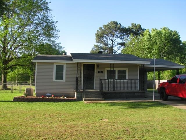Adorable house with new carpet and lots of updates. Sitting on 2 lots with huge fenced backyard and 2 out buildings with electricity. Nice deck out back for relaxing! Refrigerator, washer and dryer are negotiable. Call today to take a look!