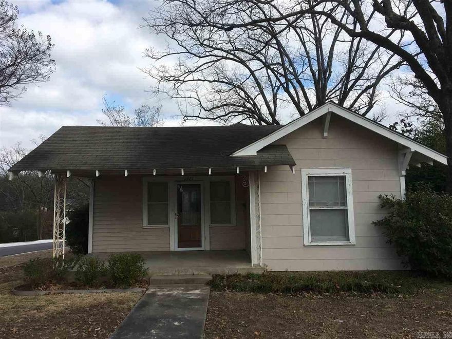 This well cared for Heights craftsman cottage has beautiful hardwood floors, central heating and air and a built in bookcase. The kitchen is fully equipped with a new gas stove, disposal, dishwasher and refrigerator. Other features include a front porch, level fully fenced corner lot, shop and nice landscaping.