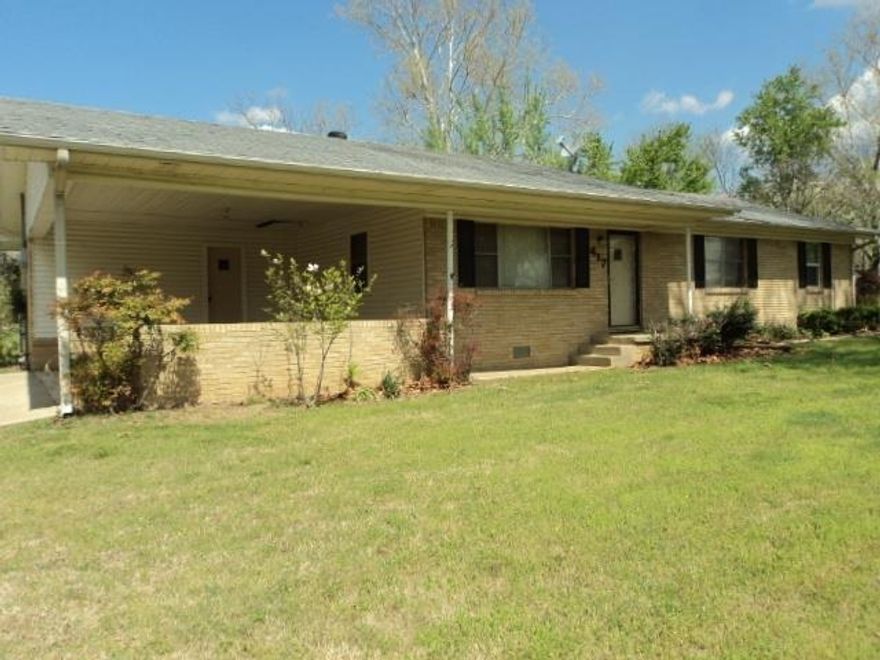 Great location on one acre of land. Needs just a small amount of TLC to be move-in ready, Buy now and out in a little sweat equity in this home. Great investment and potential high traffic. Even can be used as a business.
