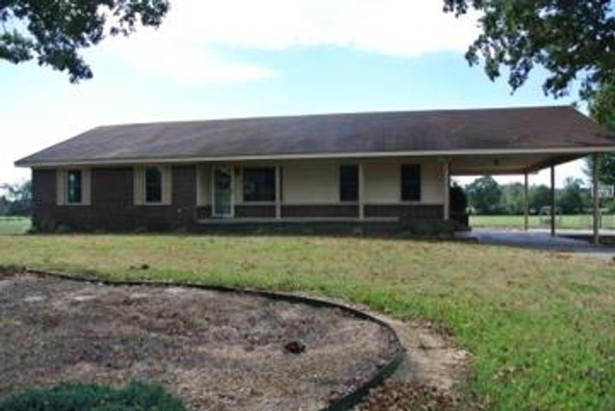 This 4 bedroom 3 bath home on 9.75 acres with a stocked pond can be yours today! Perfect for the family that needs lots of room and storage.  Not to mention the large shop that has electricity for the added space.  New interior doors, new kitchen countertops and backsplash and new dishwasher and microwave.  Enjoy your view from the deck that surrounds the above ground pool and overlooks the land where wildlife is abundant.  Double vanity sinks in the master, walk-in closets and much more.
