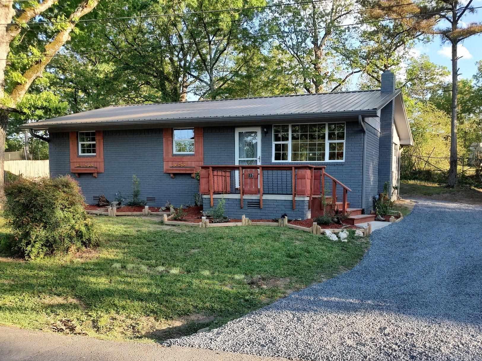 You are going to love this new listing! This 3 bedroom, 1 and 1/2 bath home has been recently remodeled and updated. So many features including a large kitchen island with quartz countertop, custom vent-a-hood, butcher block counters, gas cook stove, farmhouse sink, and that's just in the kitchen! A new metal roof, new Low-E windows with wood shutters, extra landscaping, insulated storage building, and new gutters with leaf guards will make you the envy of everyone in town. Situated on a .22 acre m/l lot in South Park subdivision (such a great neighborhood). Conveniently located near medical clinic and churches in Mount Ida. All this for just $179,000.00. Call today!