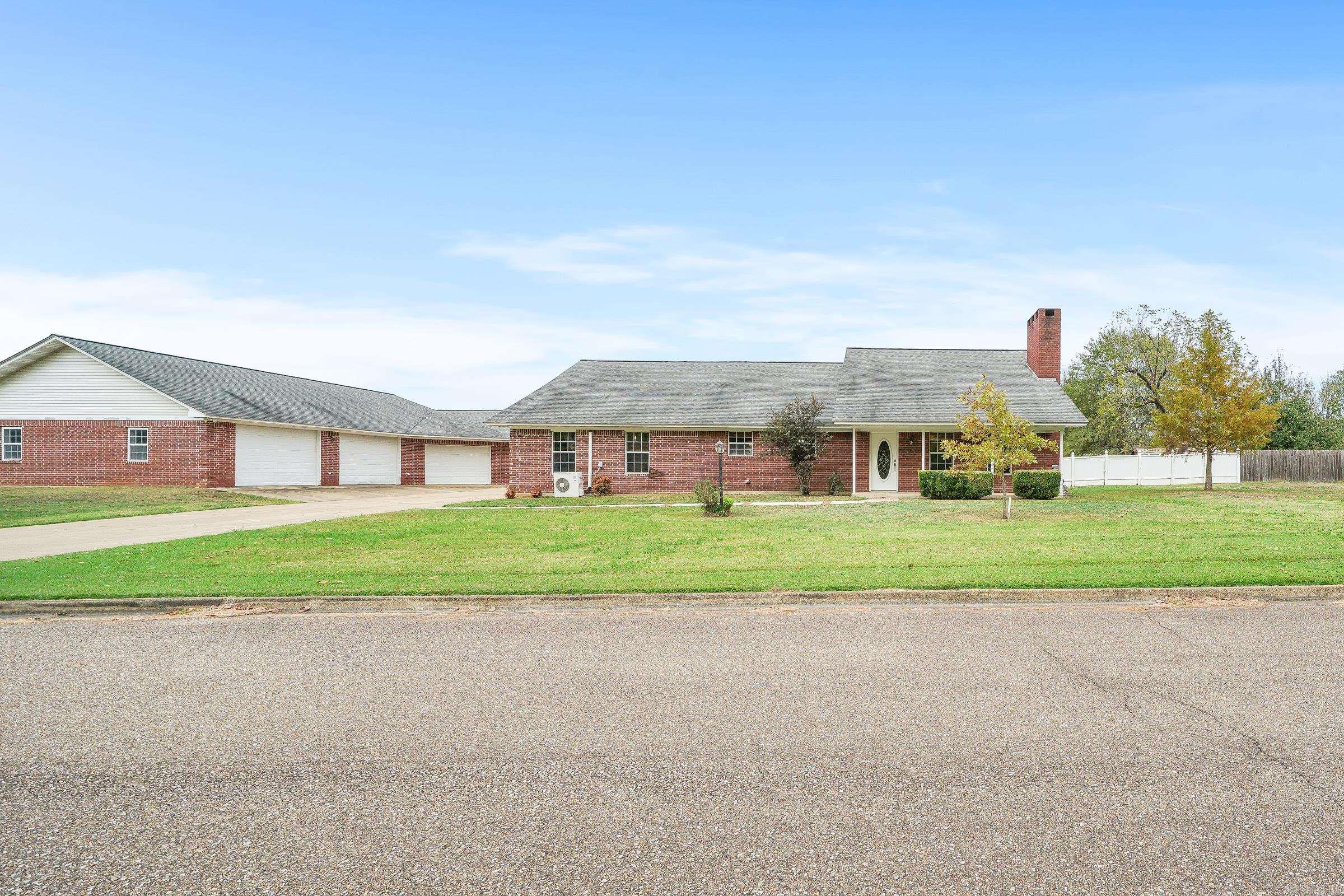 Developer's own home in one of De Queen's premier subdivisions! Entertainer's dream with spacious rooms including five beds, four bathrooms, gigantic game room with three separate living areas, wetbar, additional washer/dryer connection, and another bonus room that would be great for an in-home theater. Storage, counterspace, and built-ins galore throughout home. 5-car garage encompassing approximately 3K sq.ft., with six garage doors and full bathroom opening into expansive backyard with incredible patio and beautiful pool. This is a breathtaking home ready for its next owners!