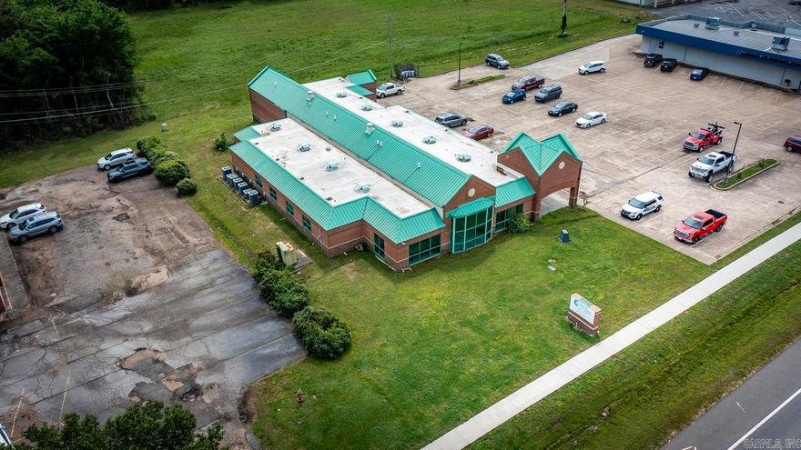Located in the heart of Prescott, Arkansas, 1440 W 1st St N offers a unique opportunity to own or lease a substantial medical facility with existing infrastructure and tenant income. Formerly an outpatient hospital, the building includes radiology capabilities, exam rooms, offices, and reception areas—ideal for medical expansion. A well-established family practice currently occupies one-third of the space, while the remaining two-thirds is vacant and ready for use as a clinic, dental office, urgent care, therapy center, or lab. Situated on a large lot with ample parking and easy highway access, this property serves the greater Nevada County area, where demand for quality healthcare continues to grow. Whether you’re an investor seeking income potential or a provider looking to expand in an underserved market, this flexible, income-producing property is ready for your vision.