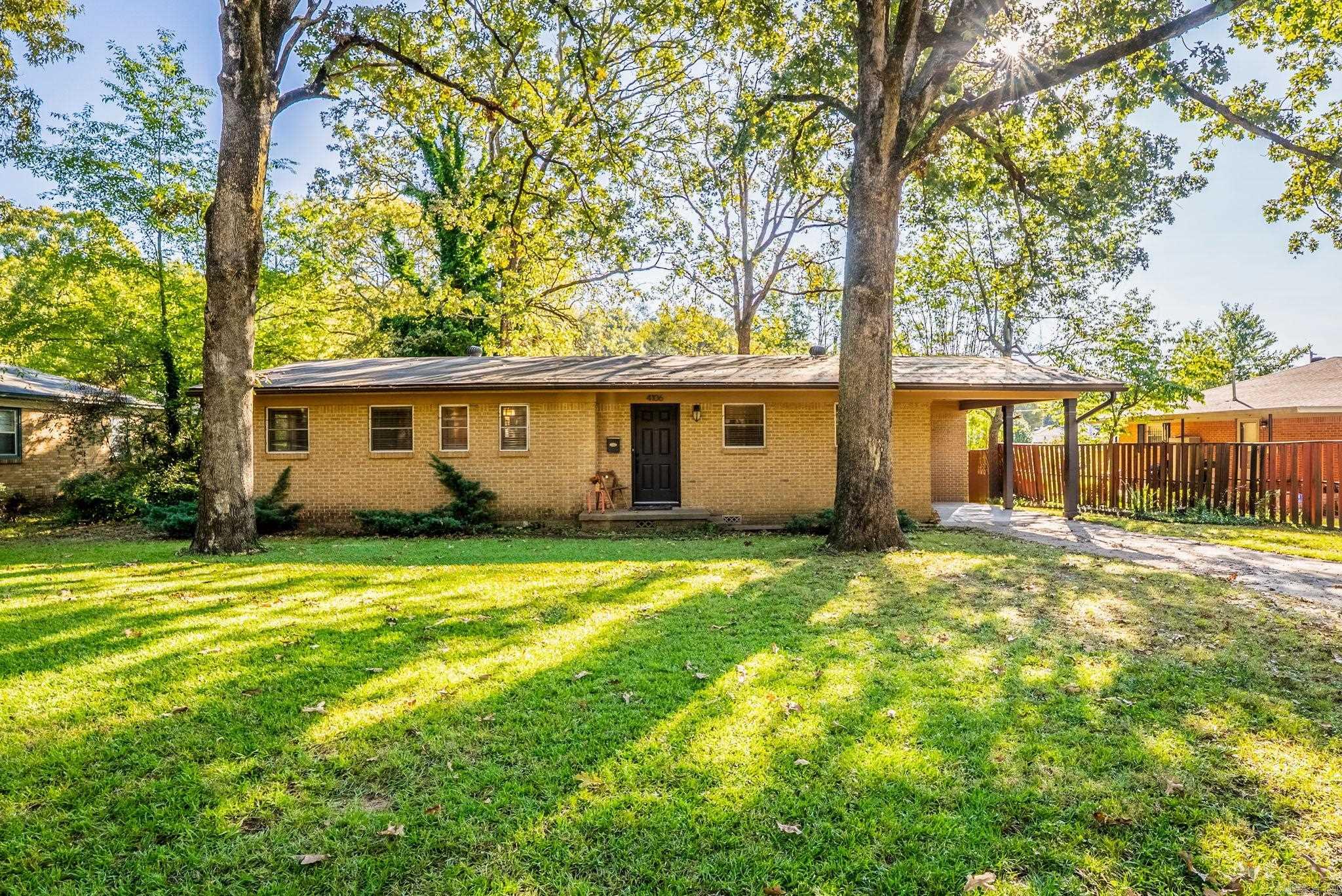 Nestled in North Little Rock's Park Hill neighborhood, this charming home is cozy and inviting with gleaming hardwood floors that add timeless character. Neutral paint colors throughout & granite countertops offer modern updates but keep the classic charm. The primary suite includes a cute half bathroom en-suite. Outside, a covered carport offers protective parking, while the flat yard makes for easy upkeep and plenty of room to play. Whether you're a first time home buyer, downsizing or simply looking for a new space to call your own, this sweet home is ready to welcome you...welcome home to 4106 Idlewild! Square footage is approximate, measuring encouraged. Agents, see remarks.