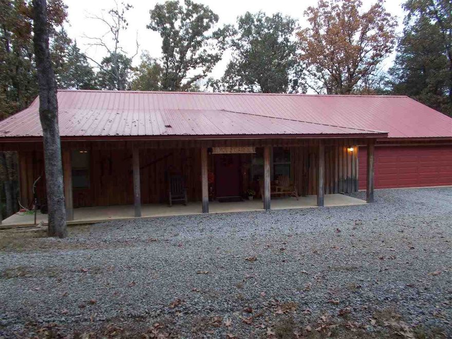 Don't miss this property! An immaculate cabin style home nestled on 3.25 private acres just 7 minutes from town. Beautiful scenery surrounds this home that offers an open floor plan and many extras. Don't wait - call for a showing today. Sq ft measurements are from tax records - buyer measurements are encouraged.