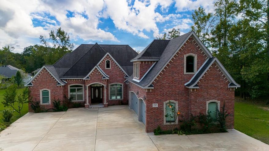 This custom-built 4-bedroom, 4-bath brick home sits on 2 private acres in the desirable Alexander/Bryant area and was completed in 2015. The open-concept layout features tall ceilings, detailed trim work, and abundant natural light. The spacious living area includes custom built-ins, while the kitchen is equipped with granite countertops, built-in appliances, and a breakfast bar. A dedicated office/study offers a quiet place to work or relax. The mudroom-style hallway with built-in shelving provides a practical entry from the 3-car garage. The primary suite includes a large walk-in closet that also functions as a storm shelter for added peace of mind. Upstairs, a versatile fourth bedroom with a full bath can be used as a game room, media room, or guest suite. The property also includes a small, tucked-away pond and offers plenty of space to add a pool or shop. Located in the Bryant School District and close to restaurants, shopping, and more!