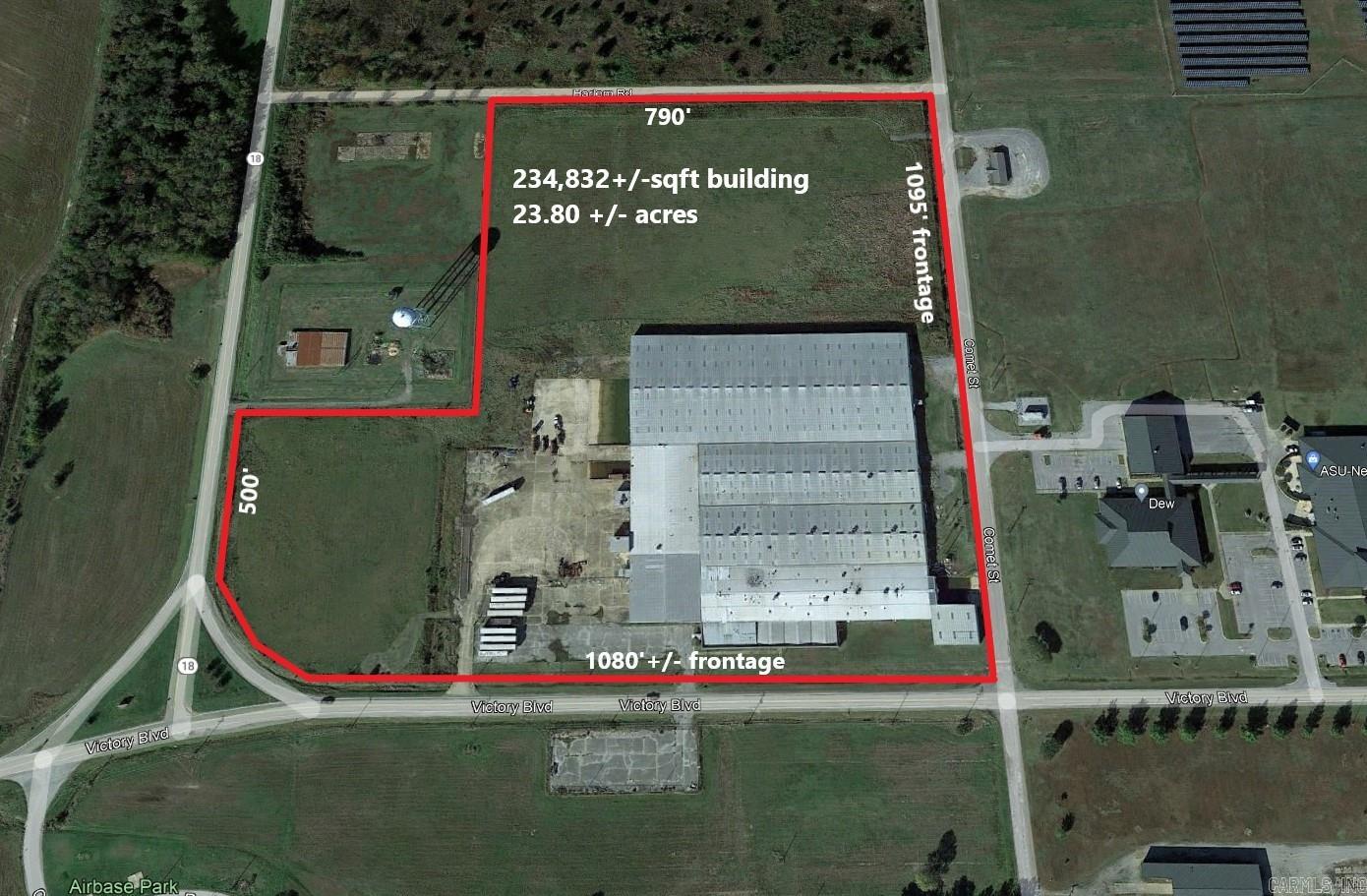 This 234,832+/- sq ft industrial building in Newport, AR is strategically located near the Newport Municipal Airport and the Arkansas State University Newport Campus. At only 2.3 miles to US-67, this well-maintained industrial/warehouse/distribution facility is situated on 23+/- level acres and has frontage on three streets. Property has many improvements completed in 2023,including repaired or replaced overhead doors, new LED lighting throughout, new roofing, new insulation, and more! Full list of 2023 improvements in documents and in brochure. Follow this link for more information from the Newport EDC about this property and the region:https://buildingsandsites.com/Property/Detail/21901 Listing offered in cooperation with Cassie Wells of Keller Williams Realty