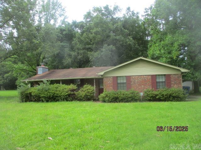 One story brick home with attached two car garage and a detached storage building. The home features three bedrooms and 1.5 baths. a backporch as an extension of the kitchen is a nice bonus. A minimum Earnest money deposit of $1000 is required. The property will be conveyed in the new owners name by a Special Warranty Deed. Property may be subject to a 3 or 5 day First Look Period.