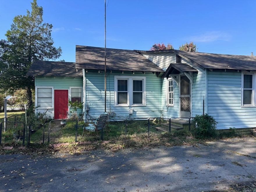 Built in 1939, this house has that old time flair and is well built.  It has a nice spacious back porch for sitting and enjoying your morning coffee while watching the squirrels play in the pecan trees in the backyard.  The backyard provides ample space for flowers and gardening.  This property is zoned for both residential and commercial.  Roof, furnace, and AC were all replaced in 2018.