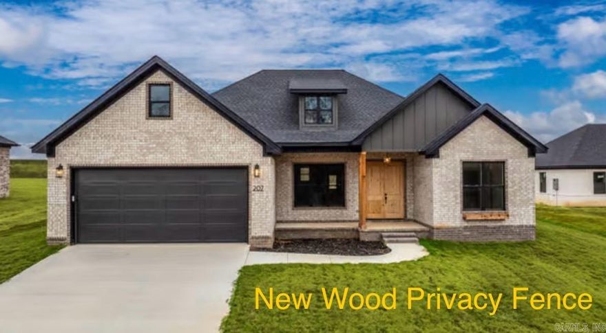 Custom maintenance-free brick home w/dark soffit/fascia,cedar accent post,flower box windows & an 18’10” covered porch w/cedar-lined ceiling & solid mahogany double doors. Located minutes from Beebe City Ball Park & Pool,quick Interstate access & just 15 minutes to the Air Base.The open living area features Coretec oak luxury vinyl flooring, custom trim,recessed lighting,ceiling fan & large triple front windows.Kitchen offers a quartz island w/bar seating,soft-close cabinetry w/gold fixtures,subway tile backsplash, decorative stove surround,stainless Frigidaire appliances & a huge pantry.Private master suite includes vaulted ceiling w/cedar beam,spa bath w/freestanding tub,custom tiled shower w/arched frameless glass, dble quartz vanity,toilet closet & walk-in closet.Three additional bedrooms w/built-ins, hall bath w/dble quartz vanity,private laundry & built-in locker nook complete the interior.Covered back patio w/wood ceiling,fan,recessed lighting & oversized backyard create the perfect outdoor retreat.