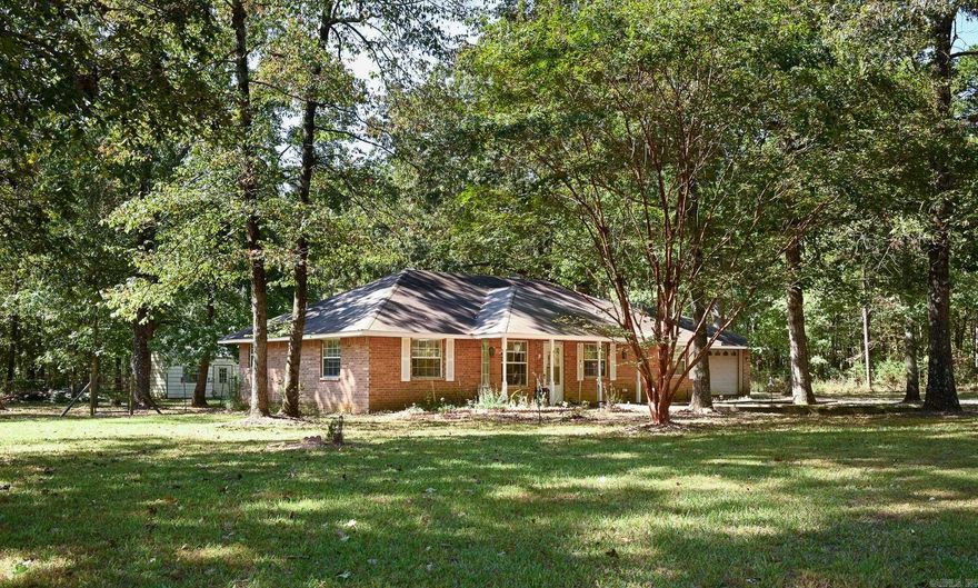 Country living with convenience! Just 5 minutes from town, this charming 3-bedroom, 2-bath brick home is set on 5 beautiful acres. The property is fully fenced and cross-fenced, offering the perfect setup for livestock or hobby farming. A greenhouse is already in place, making it easy to grow your own produce or flowers year-round. You'll also find two additional storage buildings. Inside, the home offers comfortable living with plenty of natural light and a practical layout. The kitchen and den area features a welcoming fireplace, creating a cozy space to gather with family and friends. Durable vinyl floors offer beauty and easy care.  Wired for 1G internet!  Whether you’re dreaming of a small farm, a peaceful retreat, or simply room to roam, this property delivers the space and setting to make it happen!