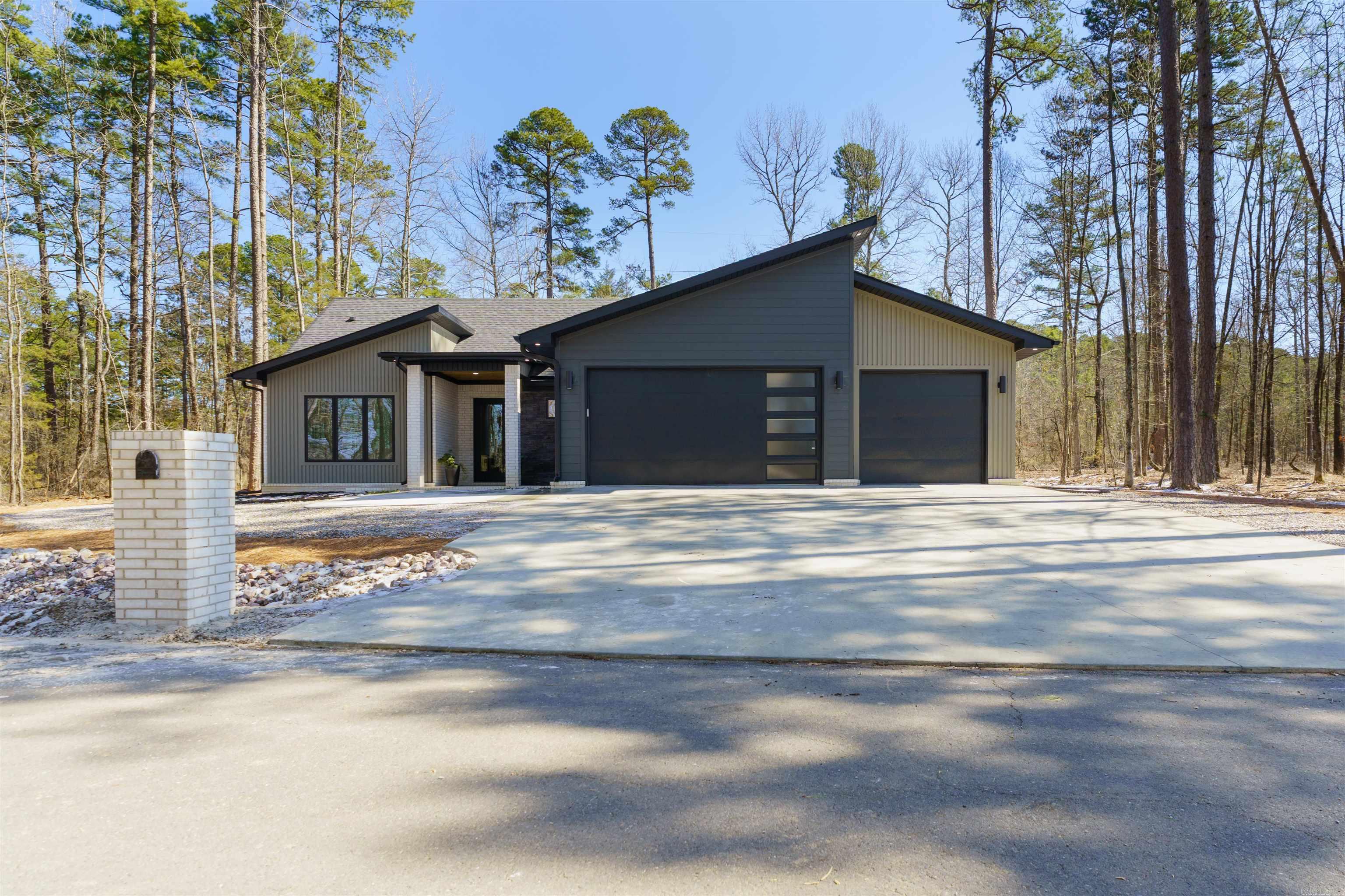 AFFORDABLE LUXURY NEW CONSTRUCTION! Enjoy the safety of gated Hot Springs Village and the convenience of this location. It is a quick commute to Hot Springs via the new bypass and just minutes from West Side stores. This home boasts an open floor plan, luxury vinyl floors throughout, granite countertops, a walk-in shower in the owners bath and a gas fireplace for cozy evenings. This home features a three car garage for all of your toys, an office nook to help handle work at home or homework and a walk-in pantry! It is located in the highly rated Fountain Lake School District, just minutes from Lake Pineda and Lake Coronado with the Coronado Center tennis facility and the Fitness Center with an indoor pool. With all of this at this price, it won't last long. A $1500 one-time buy in fee required for new residents.