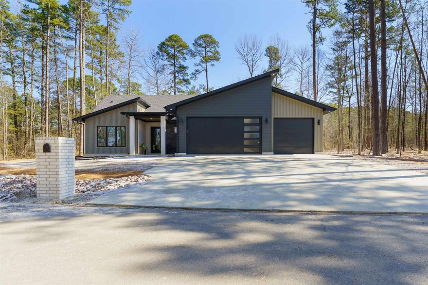 AFFORDABLE LUXURY NEW CONSTRUCTION!  Enjoy the safety of gated Hot Springs Village and the convenience of this location. It is a quick commute to Hot Springs via the new bypass and just minutes from West Side stores.  This home boasts an open floor plan, luxury vinyl floors throughout, granite countertops, a walk-in shower in the owners bath and a gas fireplace for cozy evenings.  This home features a three car garage for all of your toys, an office nook to help handle work at home or homework and a walk-in pantry!  It is located in the highly rated Fountain Lake School District, just minutes from Lake Pineda and Lake Coronado with the Coronado Center tennis facility and the Fitness Center with an indoor pool.  With all of this at this price, it won't last long. A $1500 one-time buy in fee required for new residents.