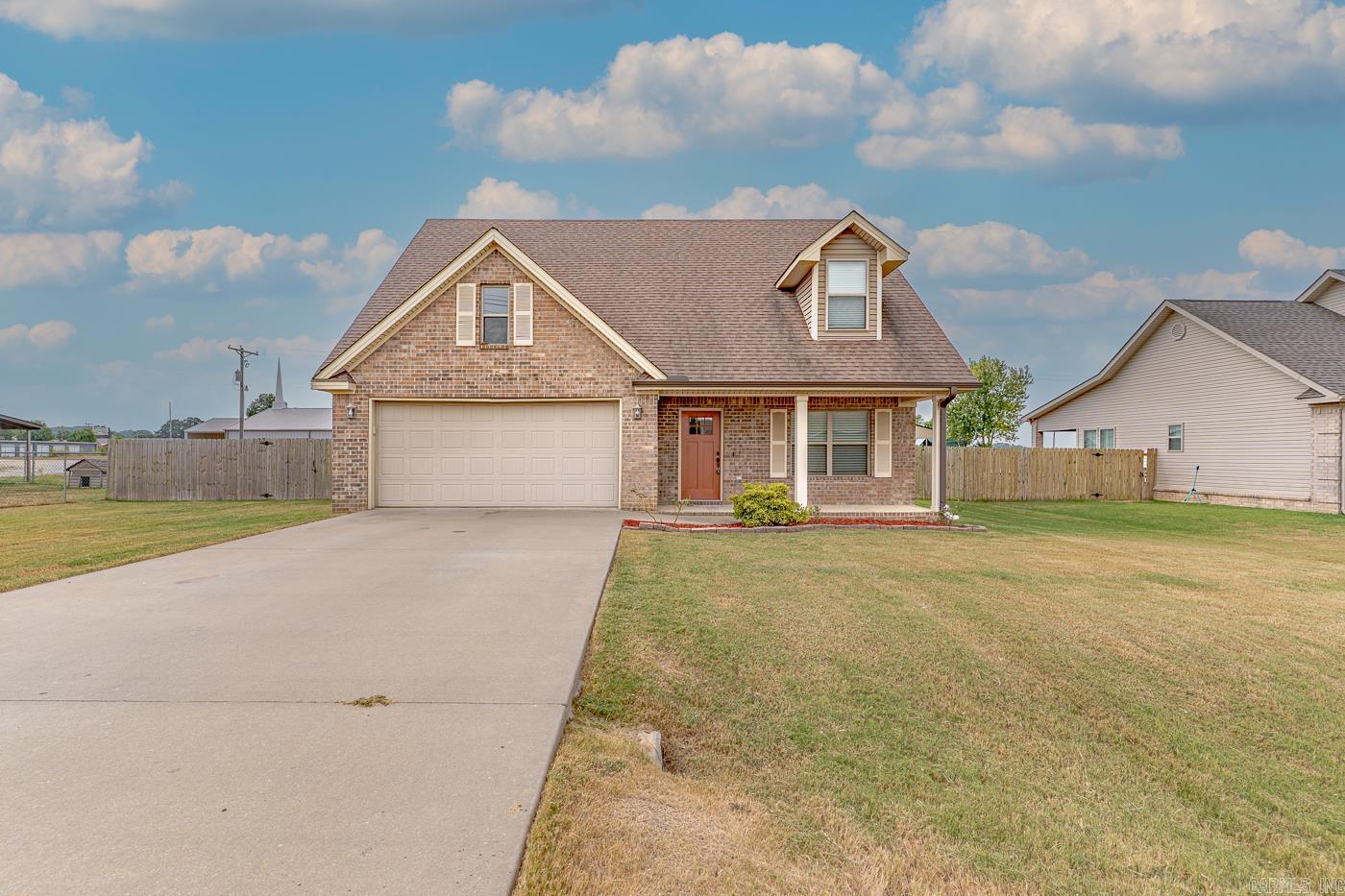 Welcome to Market 501 Emily Lane of the Dunford Village Sub. in Harrisburg, AR within the Harrisburg School District. Situated on a .21 +/- acre privacy fenced and level lot is 2018 built traditional style home wrapped in brink & vinyl, topped w/ architectural shingles, and accented by shutters, gutters, covered front porch, back patio, beautiful front door, and fresh landscaping. The interior features 1,787 sf of well laid out living space over 2 floors. On the main level is a large living room, eat-in kitchen w/ stainless steel appliances, mobile island, ample cabinet and countertop space, half bath, and access to the exterior, Master bedroom w/ walk-in closet and en-suite featuring a shower/tub combo, dual vanity, and laundry room. Upstairs are 2 generous sized bedrooms and full bath w/ shower/tub combo. Seller improvements include: window treatments, gutters, dishwasher, microwave, disposal, fencing, ring doorbell and more. This 1 owner property has been well maintained and is move-in ready. Conveniently located near favorite local amenities & Hwy 1 and just 5 miles to Lake Poinsett and 20 miles to Jonesboro. Call today to schedule your tour and make this house your home.