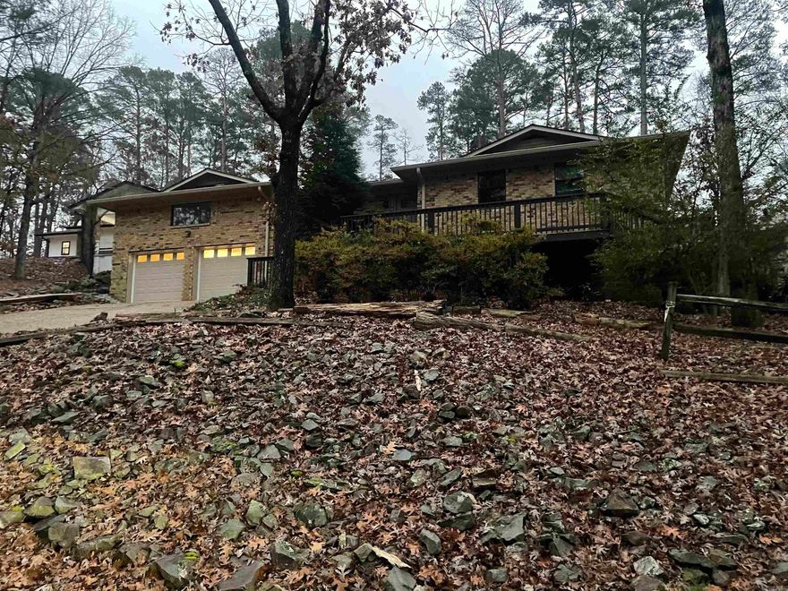 Over 2800 Sq Ft of Updated, Modern, and Inviting space.  3 Bedrooms and 3 Full Baths.  Beautiful Flooring and New Paint throughout home.  Kitchen has plenty of space, cabinets, and a Breakfast Bar.  New countertop and Stainless Steel Appliances.  Separate, Nice Size Dining Room opens out to Patio.  Entry of home provides a Gathering Room with space for Furniture and TV.  Large Den with Wood Burning Fireplace is a few steps up, and ready for Big Couch, Small Game Table and room for Your Comfy Recliners too. 2 A/C units, Fenced Backyard, 2 Car Garage, & so close to Shopping, Medical Care, Restaurants, DeSoto Club, Pickleball, Swimming Pool and Golf @ West Gate Area.