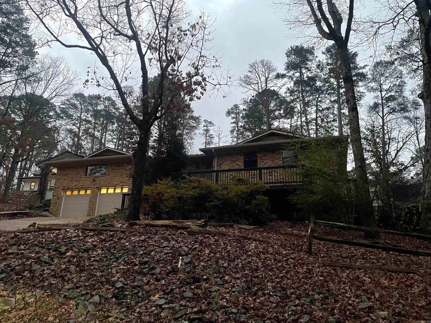 Over 2800 Sq Ft of Updated, Modern, and Inviting space.  3 Bedrooms and 3 Full Baths.  Beautiful Flooring and New Paint throughout home.  Kitchen has plenty of space, cabinets, and a Breakfast Bar.  New countertop and Stainless Steel Appliances.  Separate, Nice Size Dining Room opens out to Patio.  Entry of home provides a Gathering Room with space for Furniture and TV.  Large Den with Wood Burning Fireplace is a few steps up, and ready for Big Couch, Small Game Table and room for Your Comfy Recliners too. 2 A/C units, Fenced Backyard, 2 Car Garage, & so close to Shopping, Medical Care, Restaurants, DeSoto Club, Pickleball, Swimming Pool and Golf @ West Gate Area.