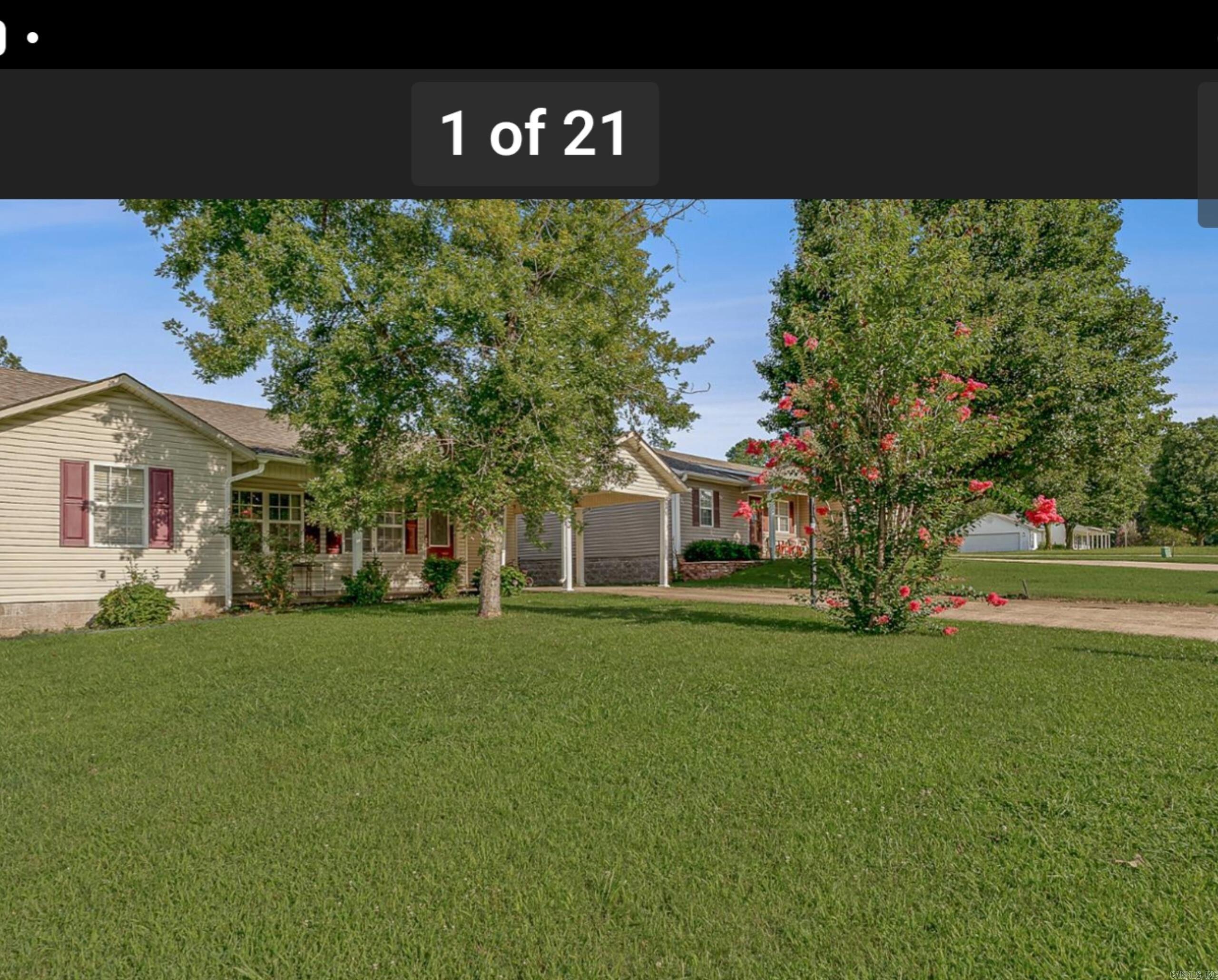Three Bedroom, two bath, 1 car carport. Fenced in back yard.