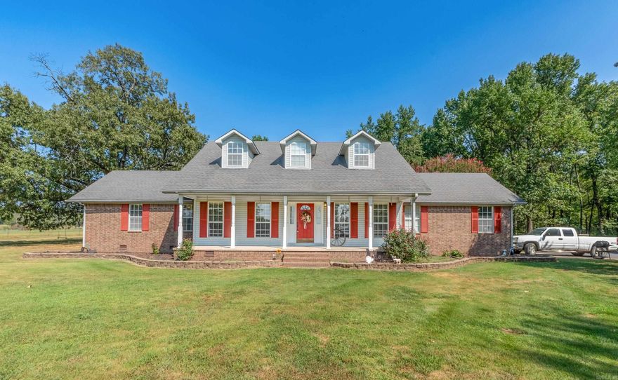 Come take a look at this beautiful 2 story home with over 8 acres! 5 bedroom 3 bath home with a 40x40 insulated workshop with electricity and plumbing for bathroom. Master bedroom and full bath with walk in closet is located downstairs. 4 bedrooms with large closets and full bathroom located upstairs. Enjoy the beautiful scenery with access to the 16x32 covered deck. Storm shelter. 2 new HVAC units. Gated driveway. Schedule your showing today! Agents, See Remarks.